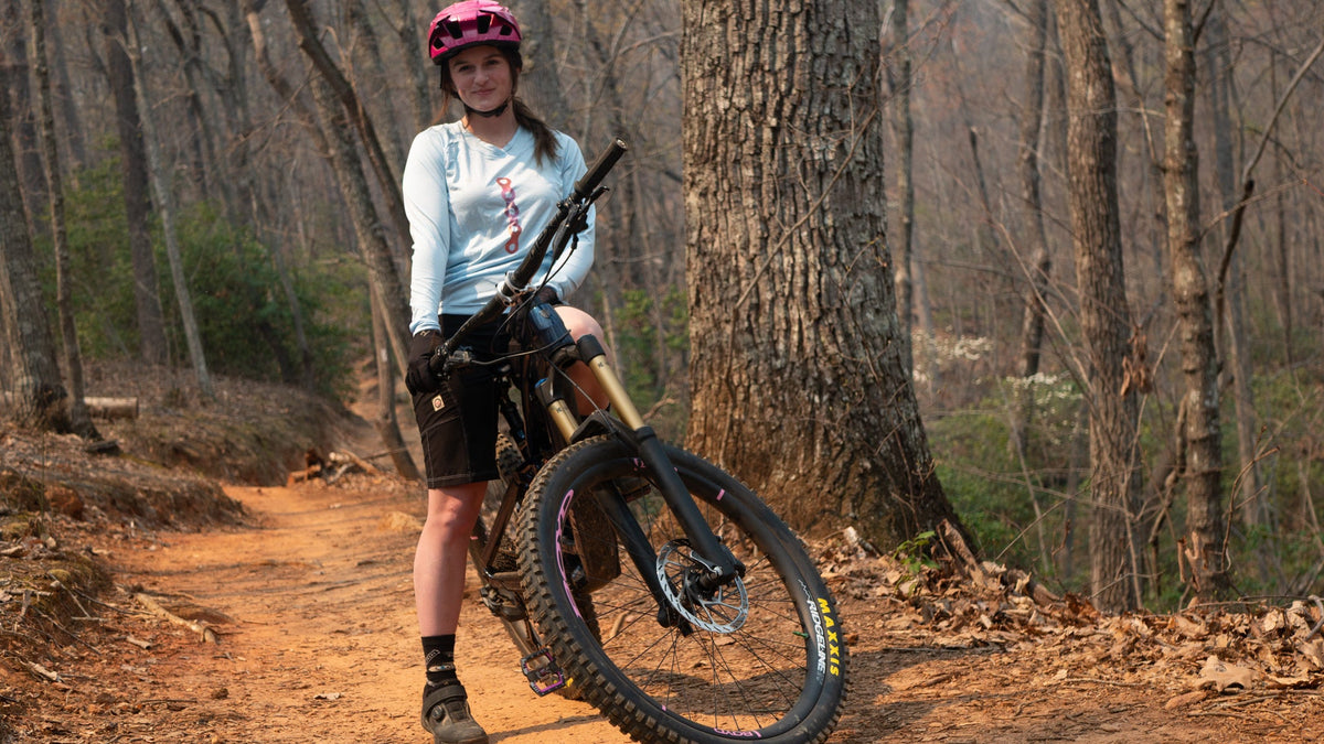 Moxie Sun Saver Hoodie for biking, with lightweight, moisture-wicking fabric and UPF 36+ sun protection.