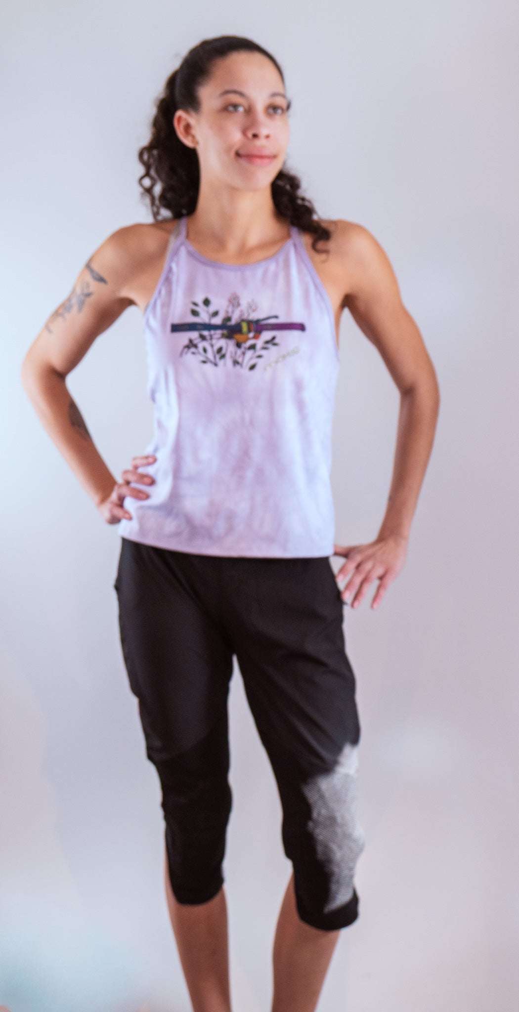 Women's sleeveless mountain bike jersey with hand-dyed fabric and artistic bike graphics by Moxie, moisture-wicking and trail-ready design