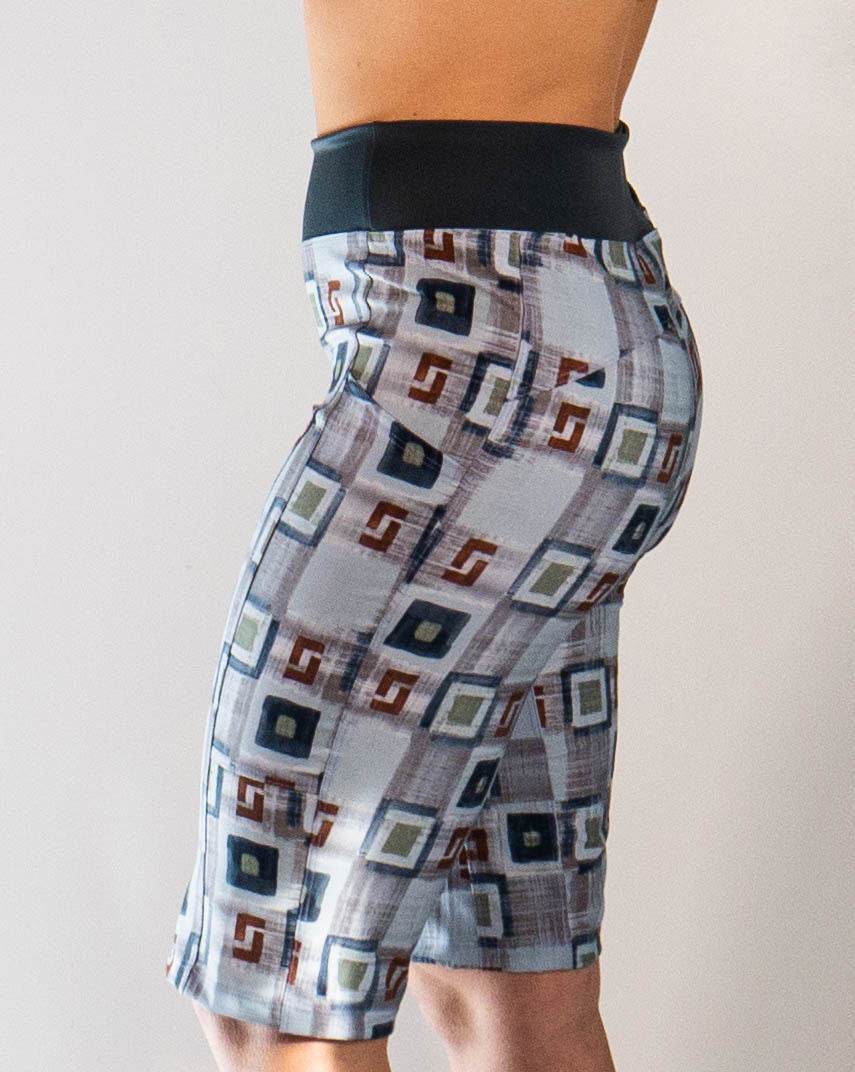 Women's mountain bike short with hopscotch plaid pattern and contoured elastic waistband.