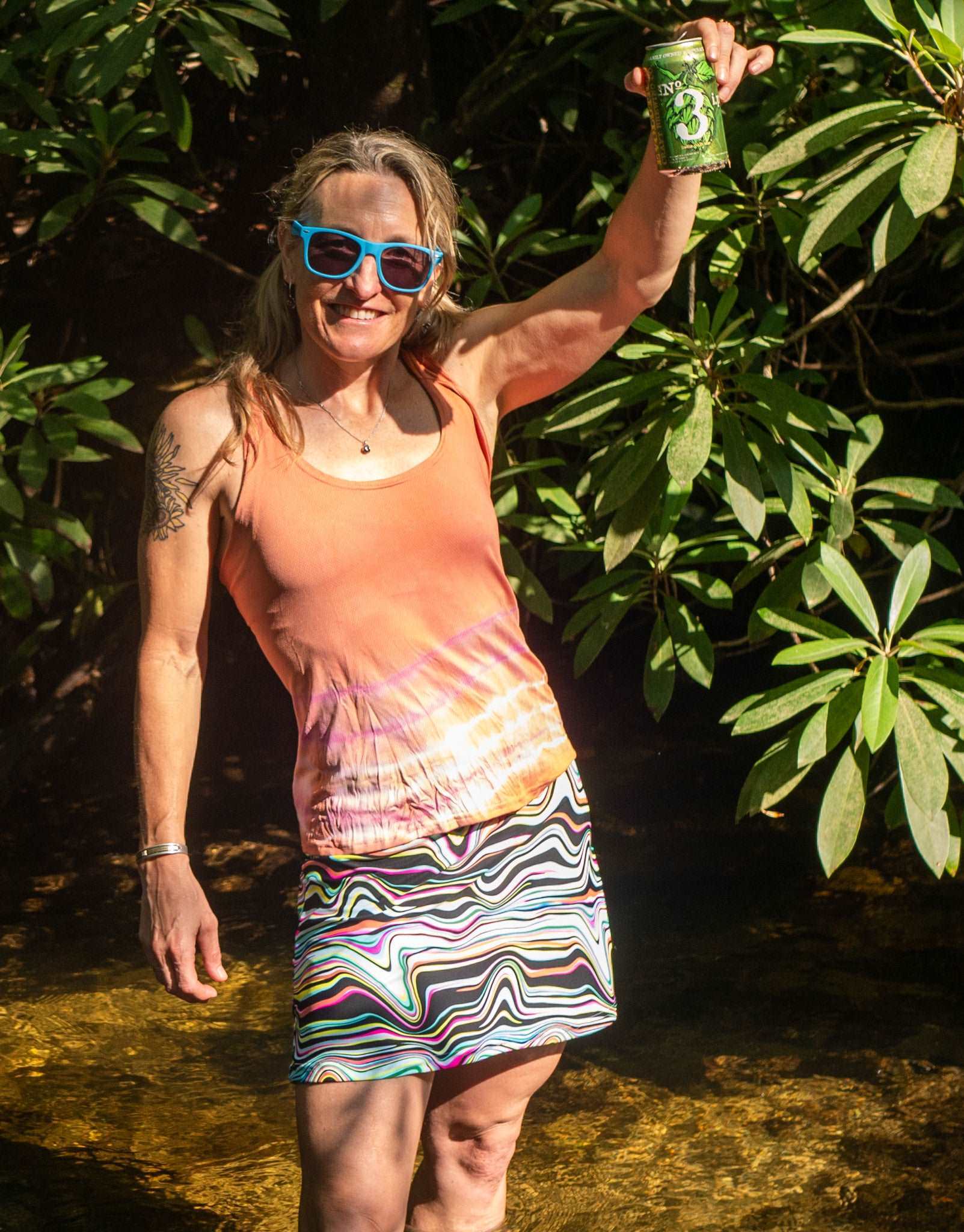 Sports Skirt- Wavey Stripes in lightweight performance fabric with colorful pattern and A-line cut.