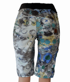Mountain bike shorts with new print, designed for women; features comfort waistband, versatile pockets, and purple top stitching.