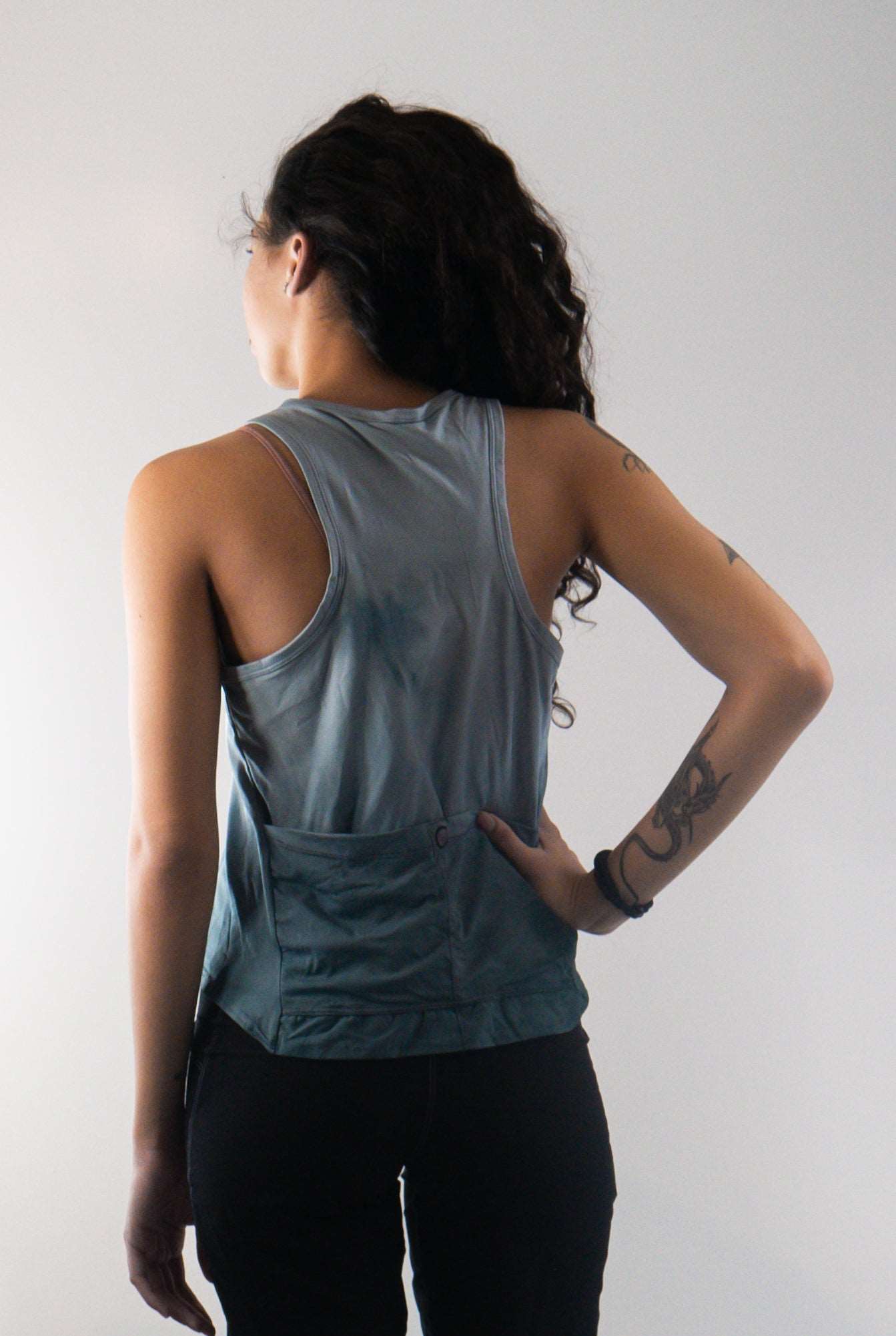 Trail Blazer Mountain Bike Top in Misty Blue with back pockets and breathable fabric.