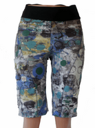Women's mountain bike shorts with colorful print, featuring comfortable yoga waistband, versatile pockets, and stretchy moisture-wicking fabric.