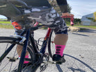 Cyclist wearing Moxie Socks - Moxie Yellow with a 6" cuff.