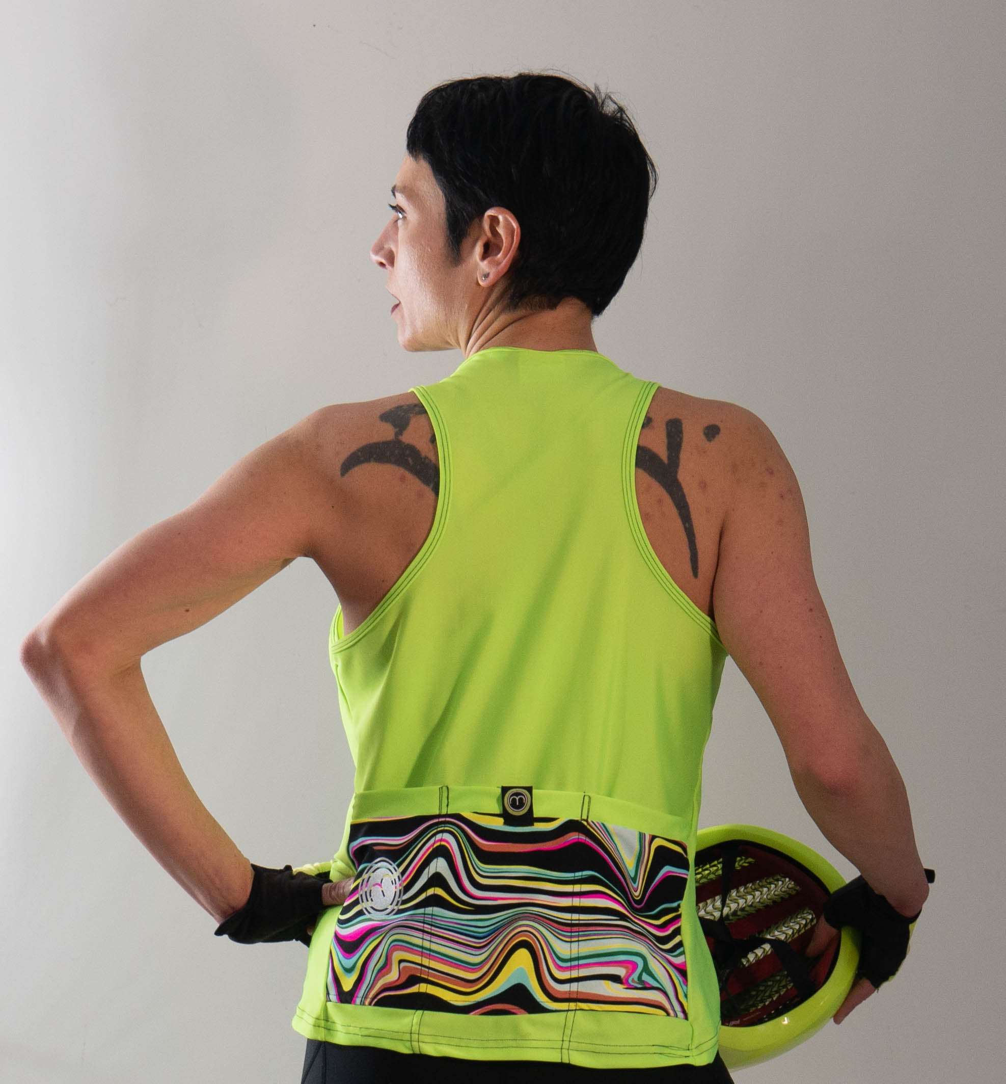 High Vis Sweep Tank Jersey with two full back pockets and A-line fit, moisture-wicking fabric, UPF 45+, bright design.