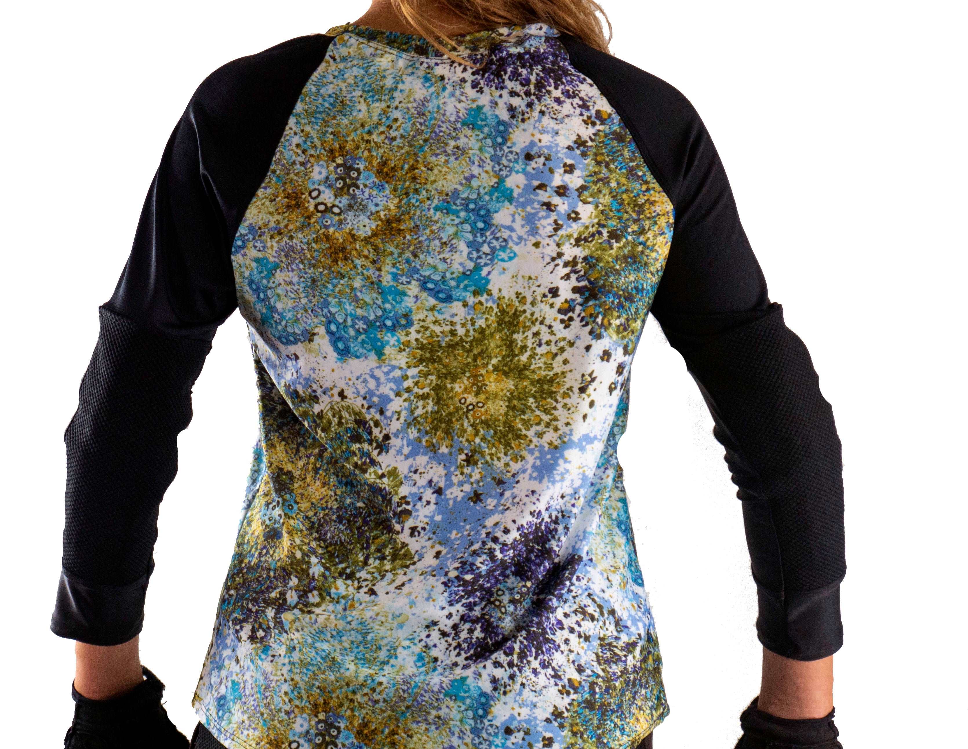 Mountain Bike Top Jet Black with colorful print and elbow pads.