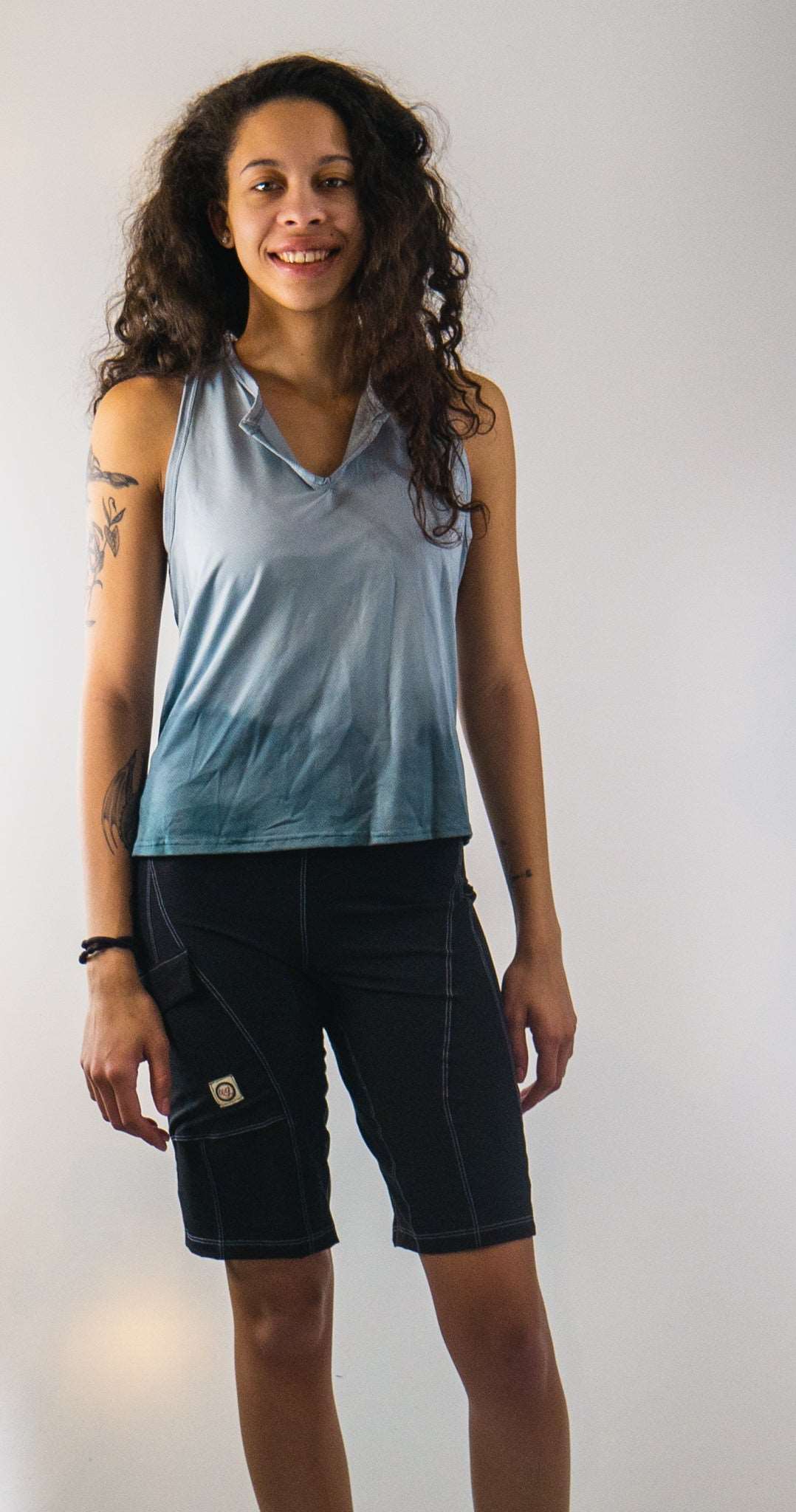 Trail Blazer Mountain Bike Top in Misty Blue, breathable fabric, drop V neckline.