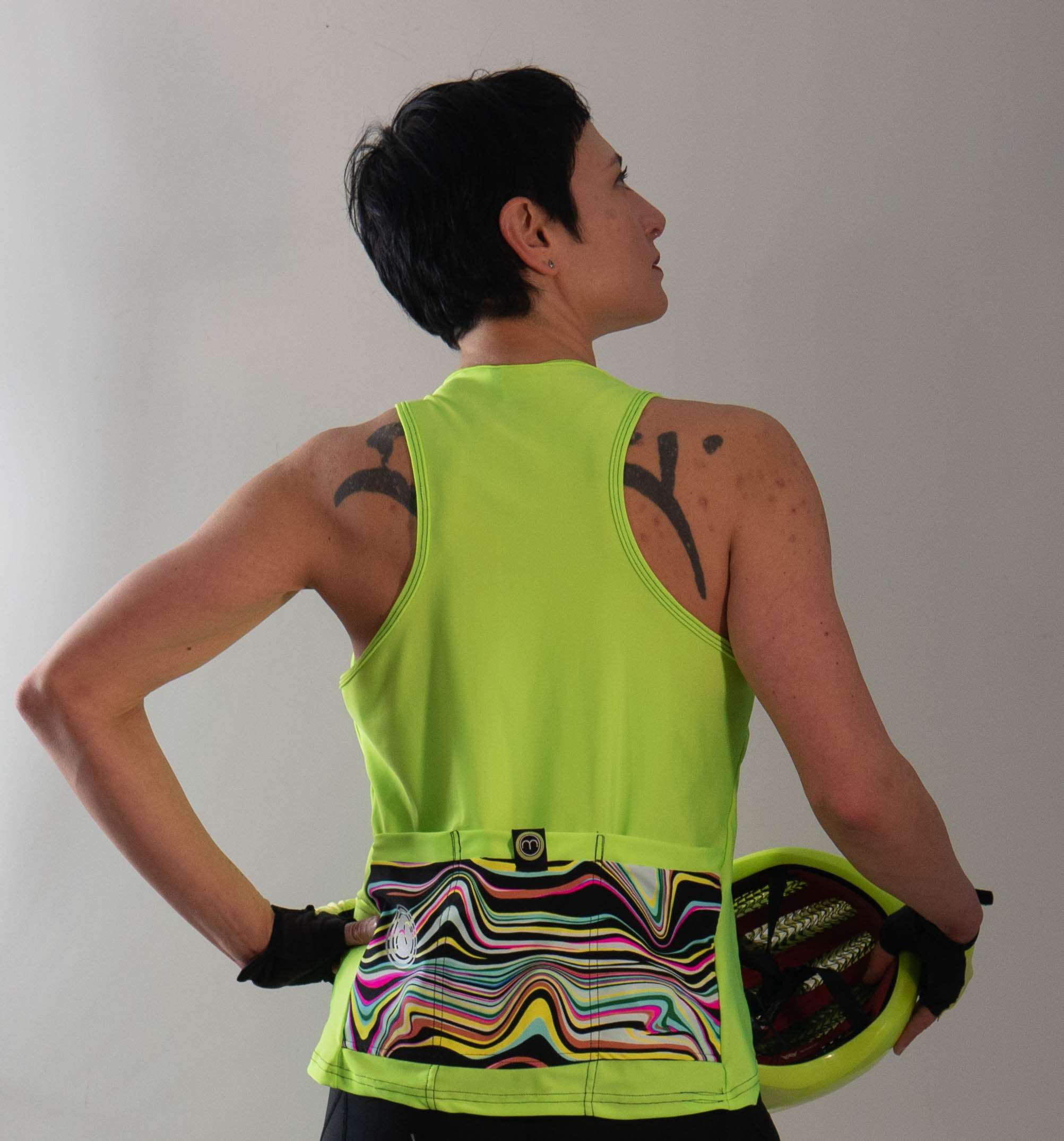 High Vis Sweep Tank Jersey with back pockets, moisture-wicking fabric, and A-line fit.
