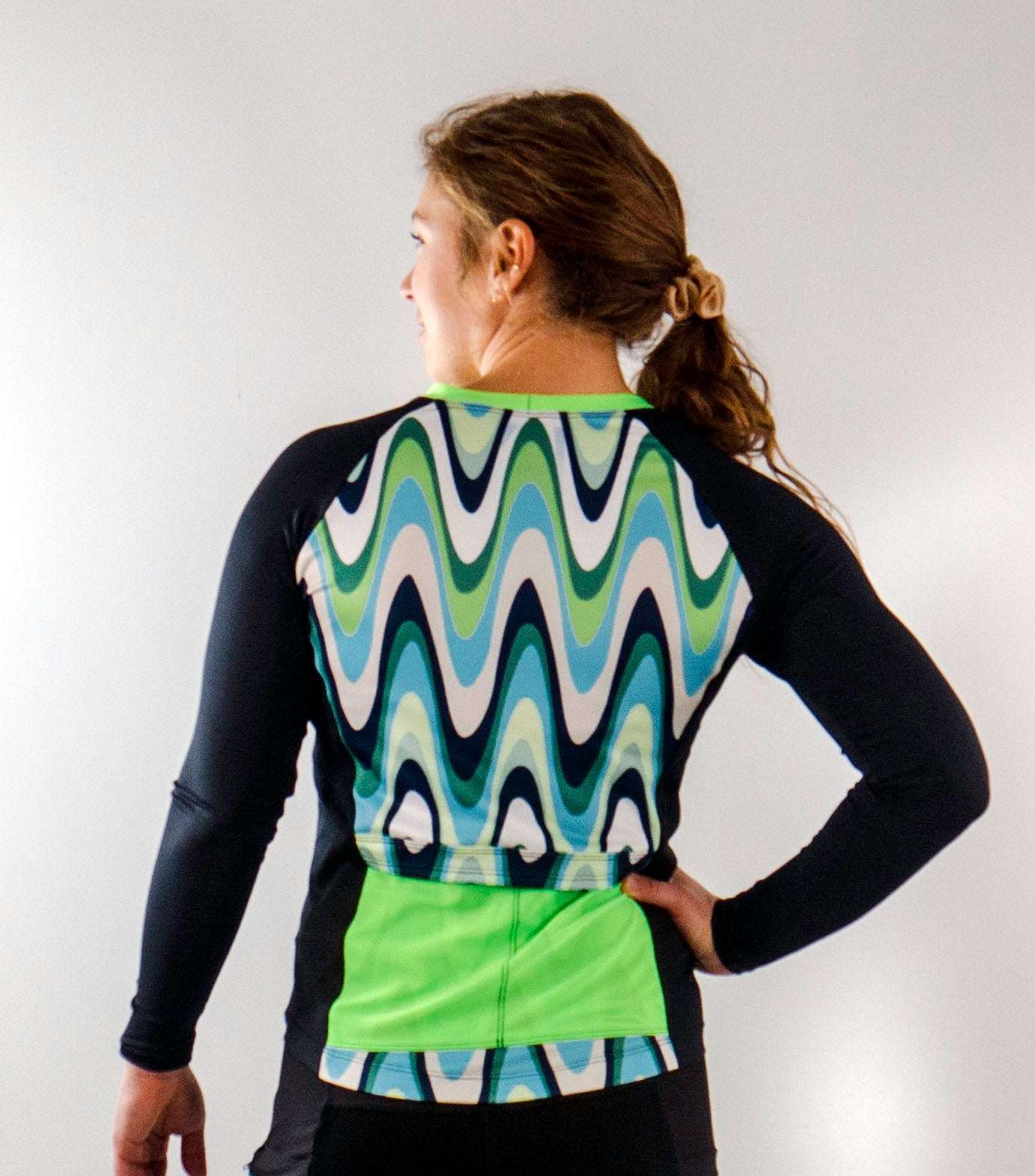 Moxie Tee Long Sleeve Jersey Color Wave with vibrant pattern and moisture-wicking fabric.