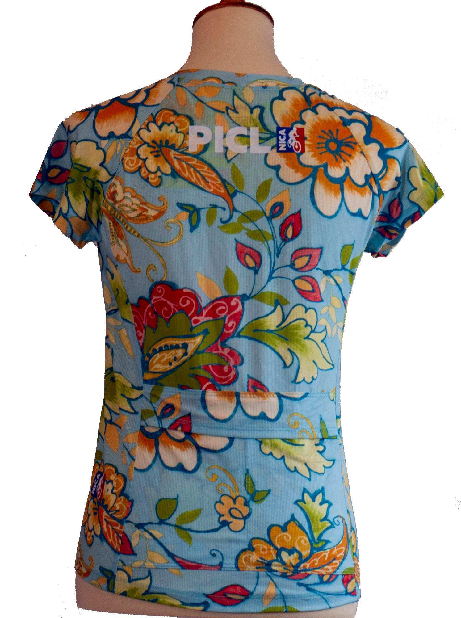 Women's PICL GRiT Tee cycling jersey with colorful floral design and back pockets for essentials