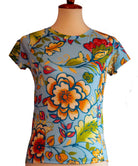 Women's PICL GRiT Tee cycling jersey with colorful floral pattern and short sleeves for performance and comfort