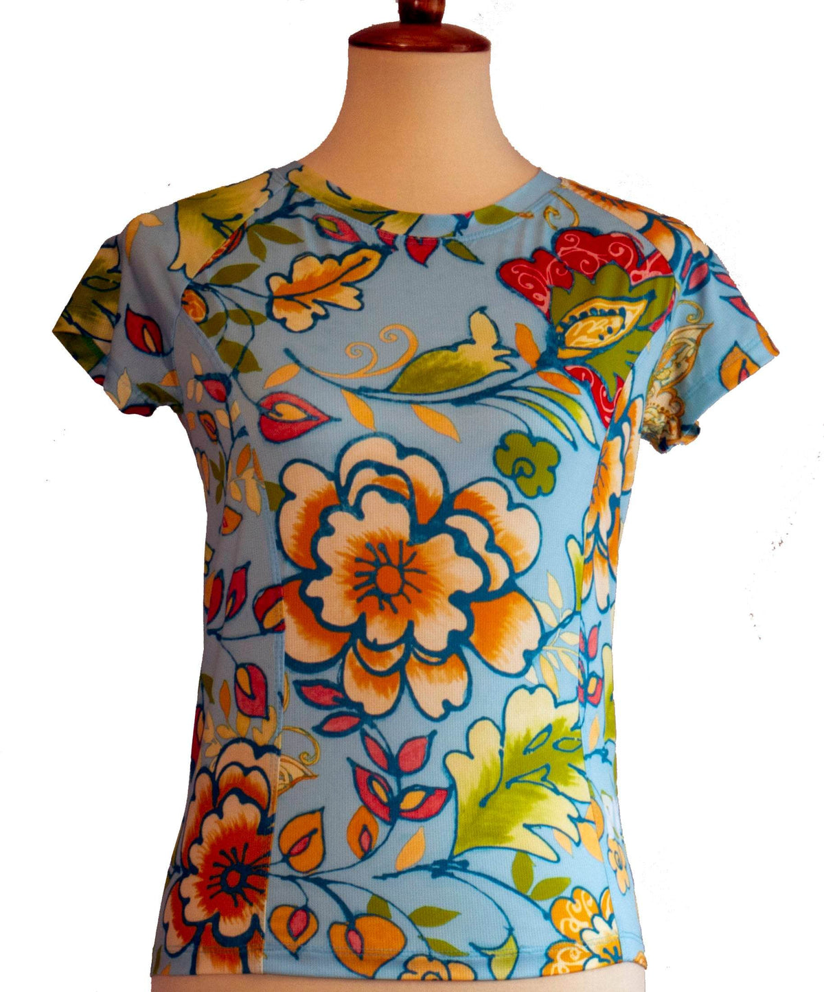 Women's PICL GRiT Tee cycling jersey with colorful floral pattern and short sleeves for performance and comfort