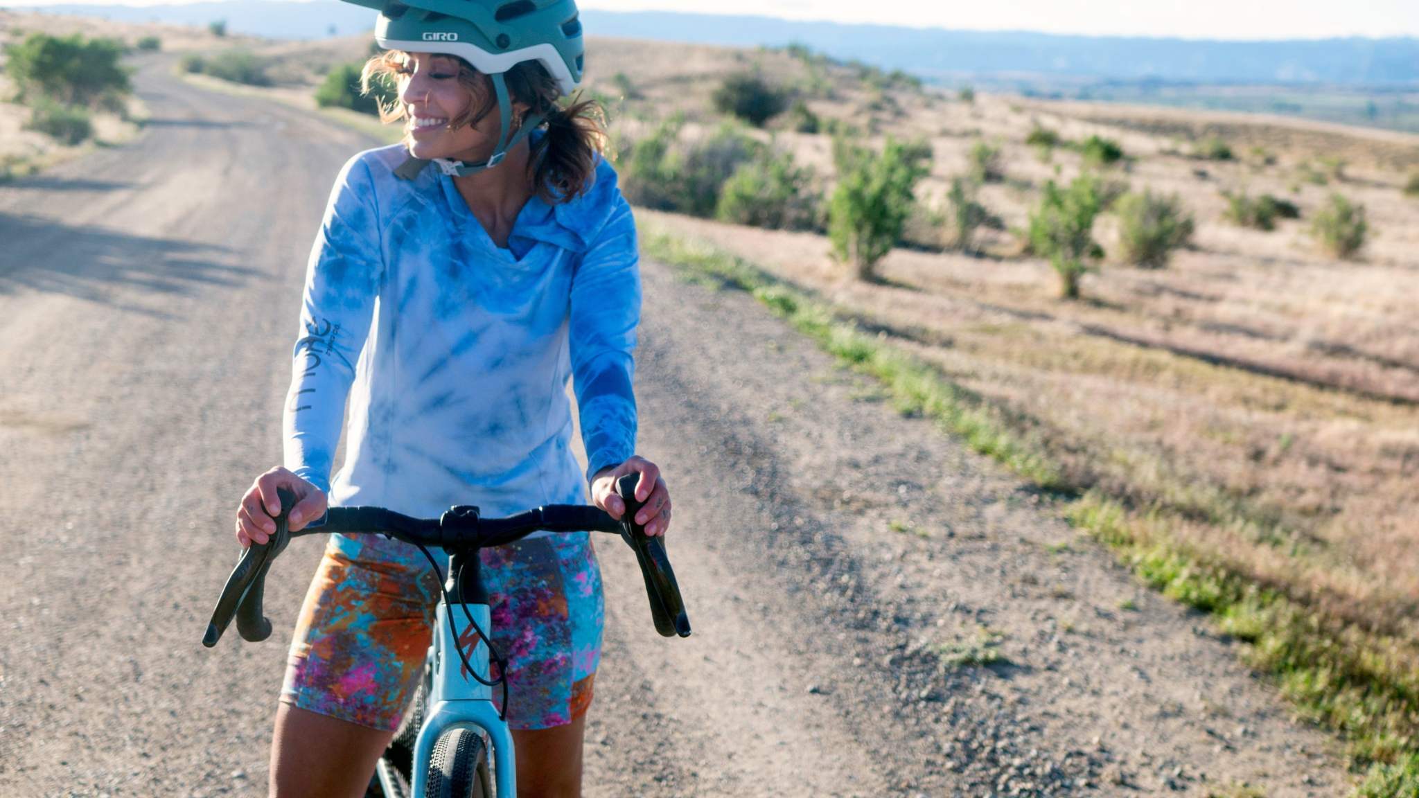 Women's gravel bike shorts with colorful design, featuring performance chamois and moisture-wicking fabric for cycling comfort and style.