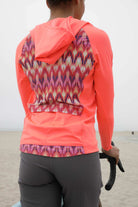 Moxie Tee Heavier Weight hoodie in bright color with patterned back, designed for biking.