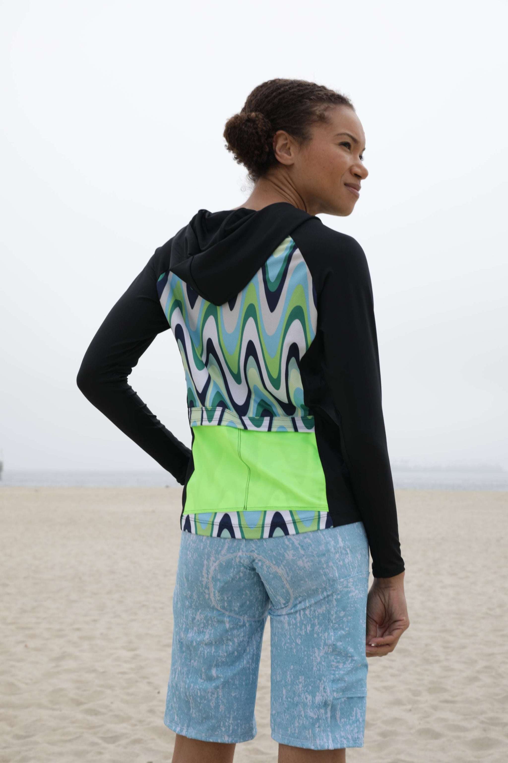 Moxie Hoodie High Visibility Color Wave with performance fabric and moisture-wicking technology for cycling.