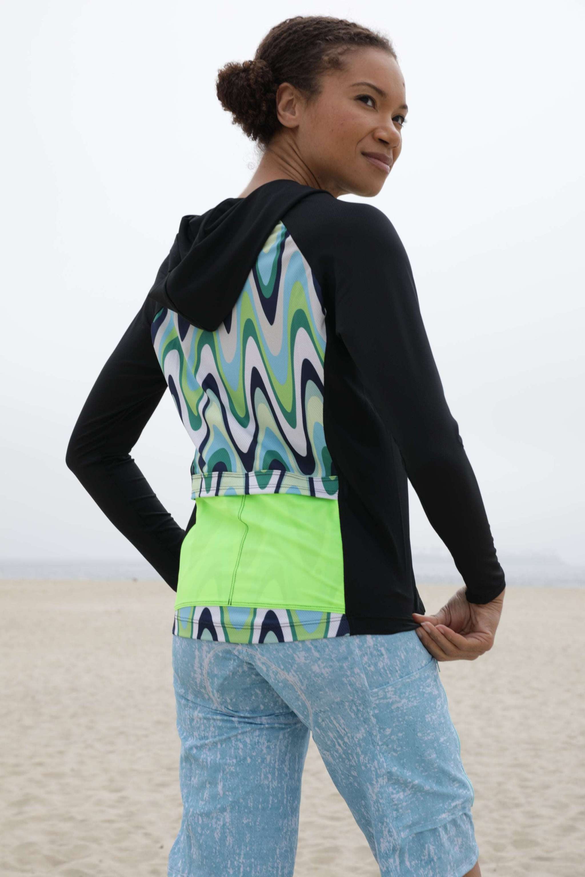 Moxie Hoodie High Visibility Color Wave with moisture-wicking fabric, bright design, and perforated mesh for quick dry and endurance.