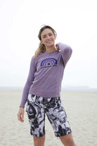 Women wearing Mountain Short-Yin & Yang bike shorts with stylish black and white design, outdoor setting.
