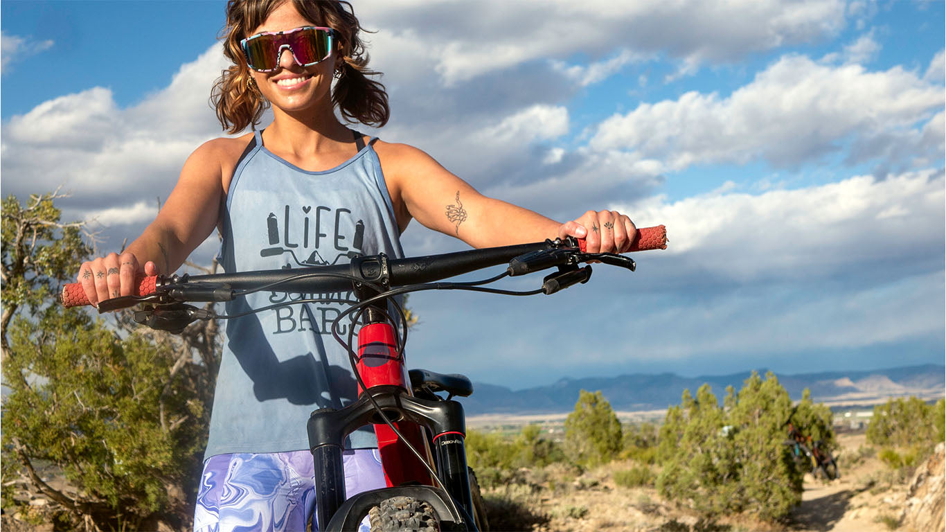 Women's cycling shorts with 5" inseam in outdoor setting, featuring comfort and performance design.