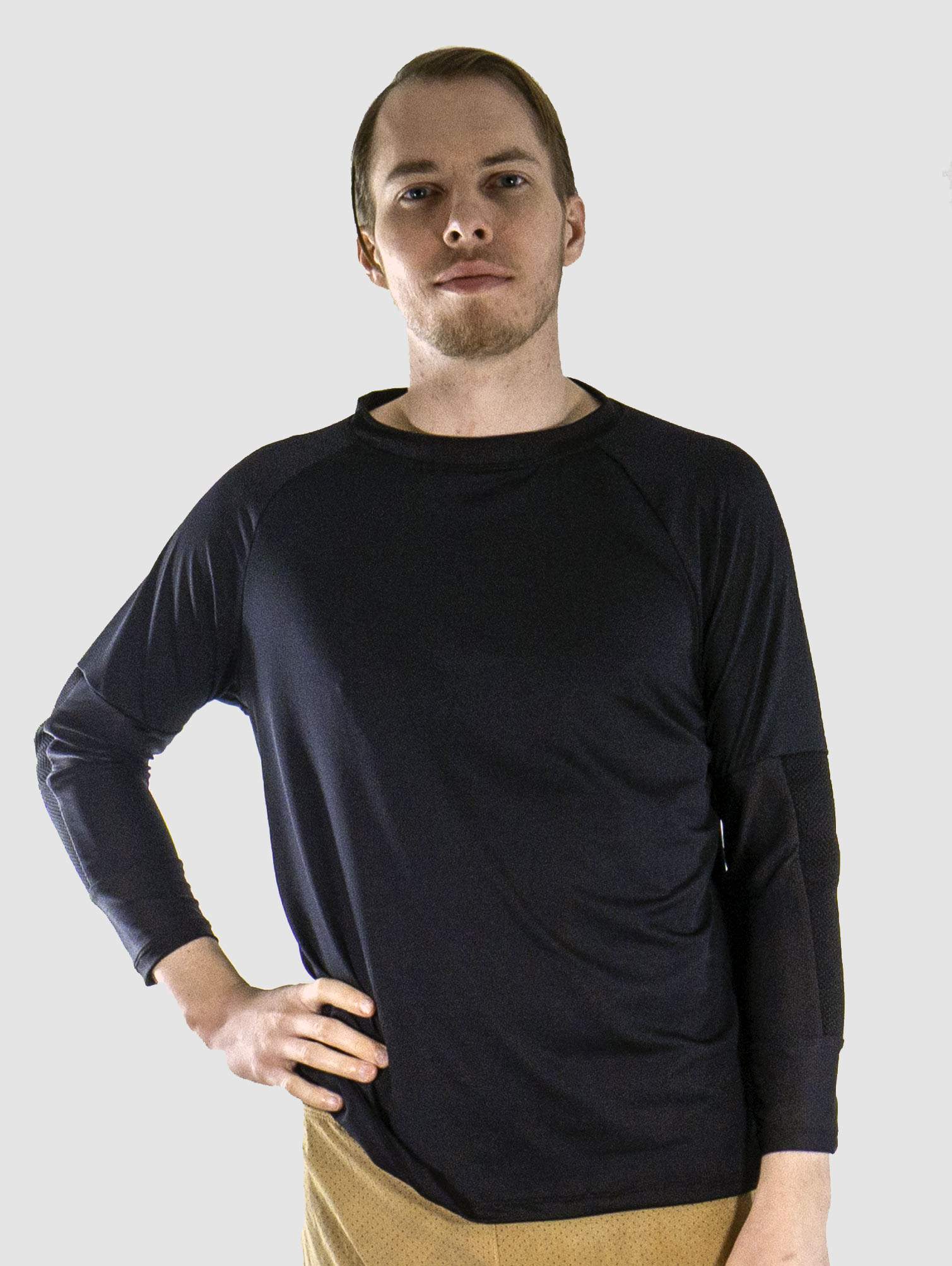 Men's G-Form mountain bike jersey in black with removable G-Form elbow pads and breathable, moisture-wicking fabric