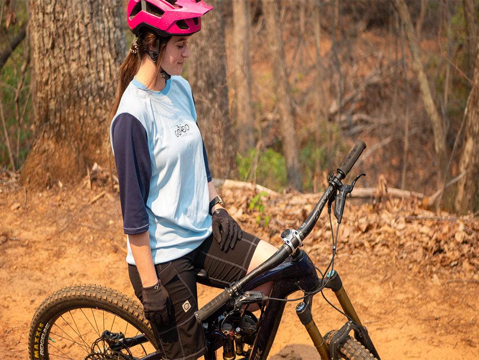 All Gender Jersey short sleeve mountain bike jersey with performance fabrics, worn by cyclist.