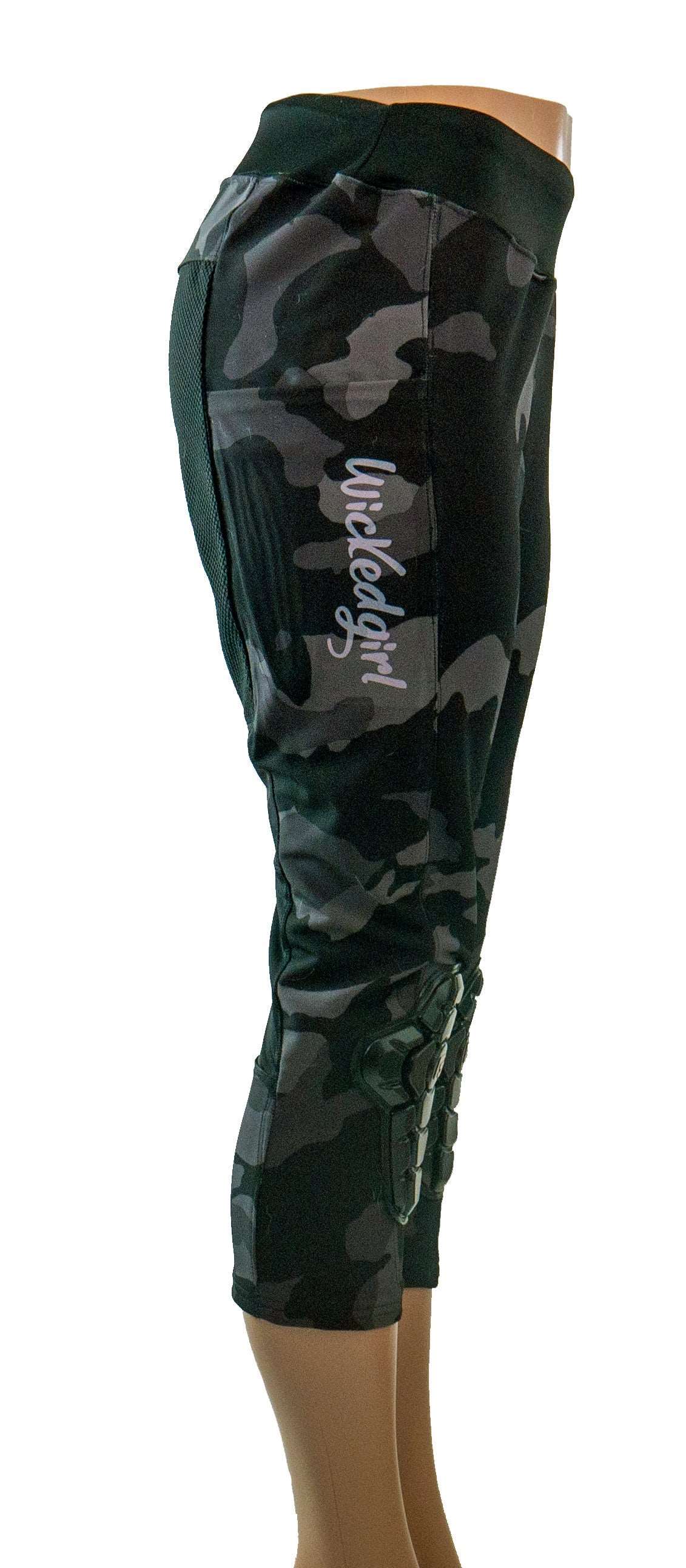 Technical mountain bike pants for women with integrated G-Form pads — side view, reinforced knees