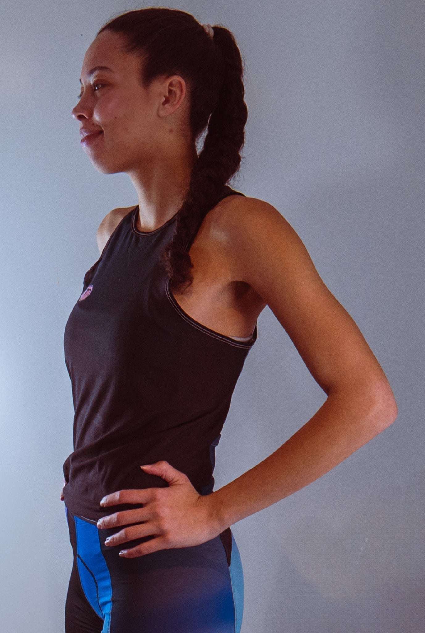 Women's sleeveless bike jersey with breathable active mesh fabric.