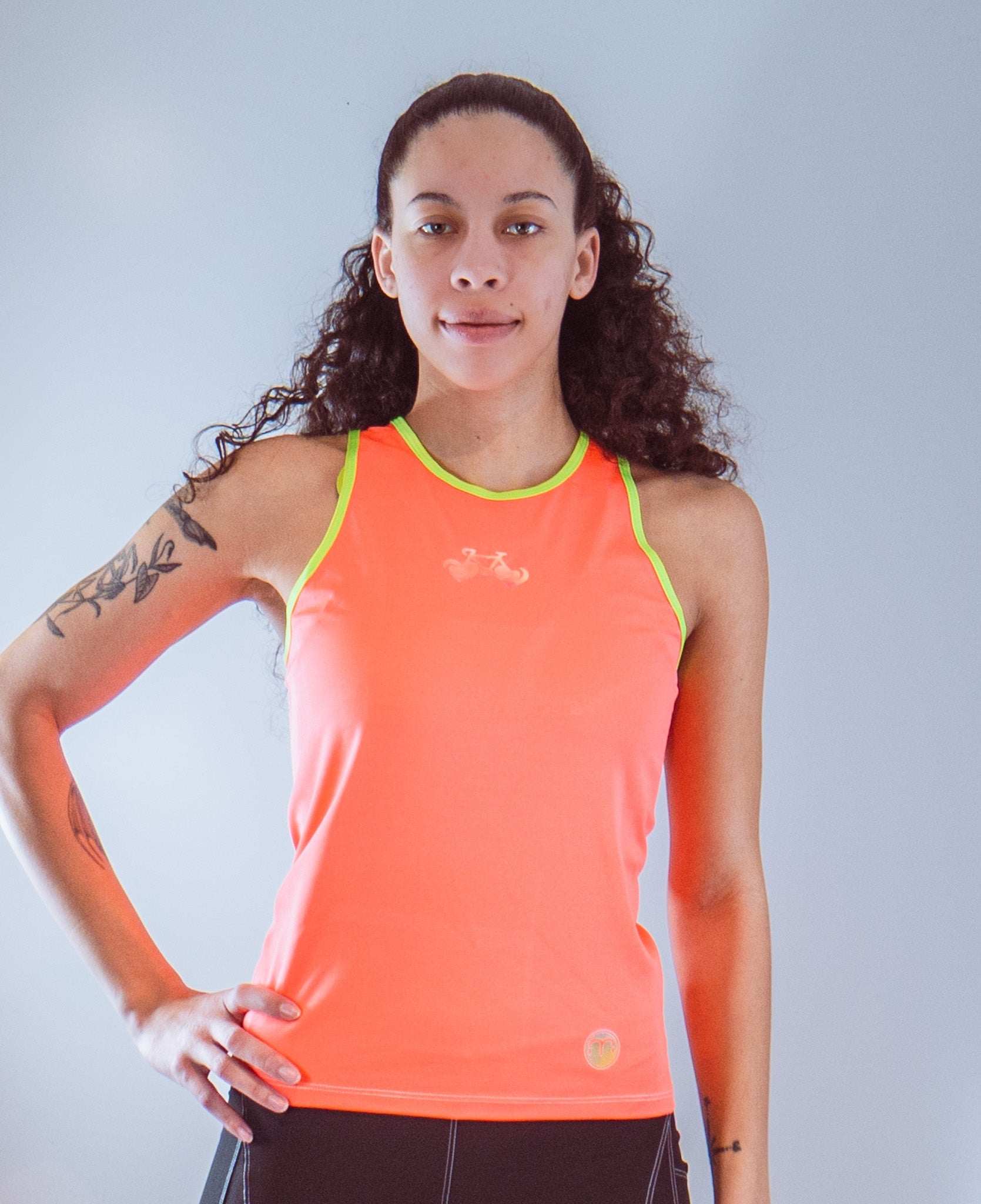 Women's sleeveless bike jersey in high visibility neon colors with Fun Bike Luv graphic; features a back pocket for essentials.