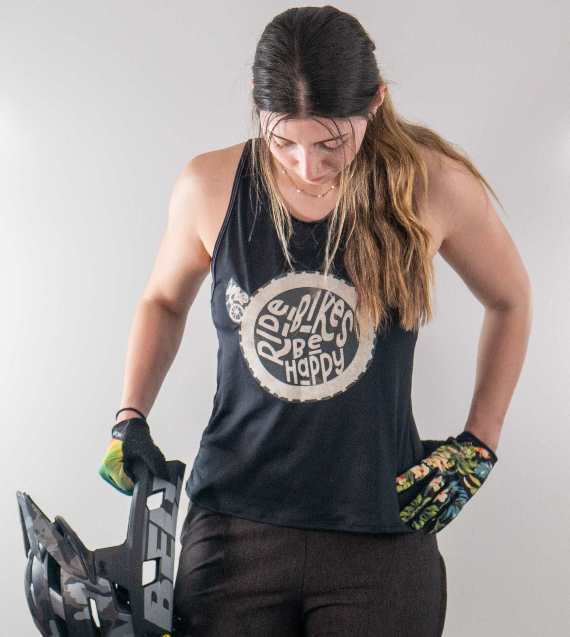 Light mesh black tank top with "Ride Bikes Be Happy" graphic, ideal for mountain biking, featuring a loose fit, moisture-wicking fabric, and drop back design.