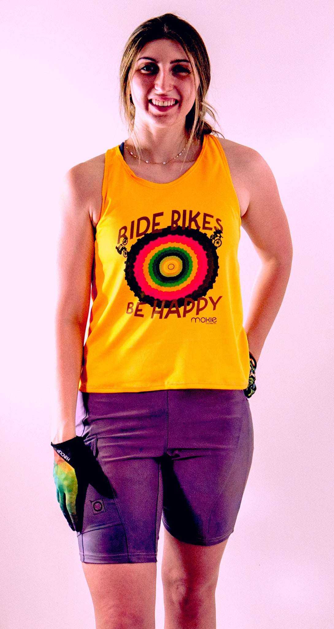 Breathable tech tank for outdoor adventures with drop tail design.