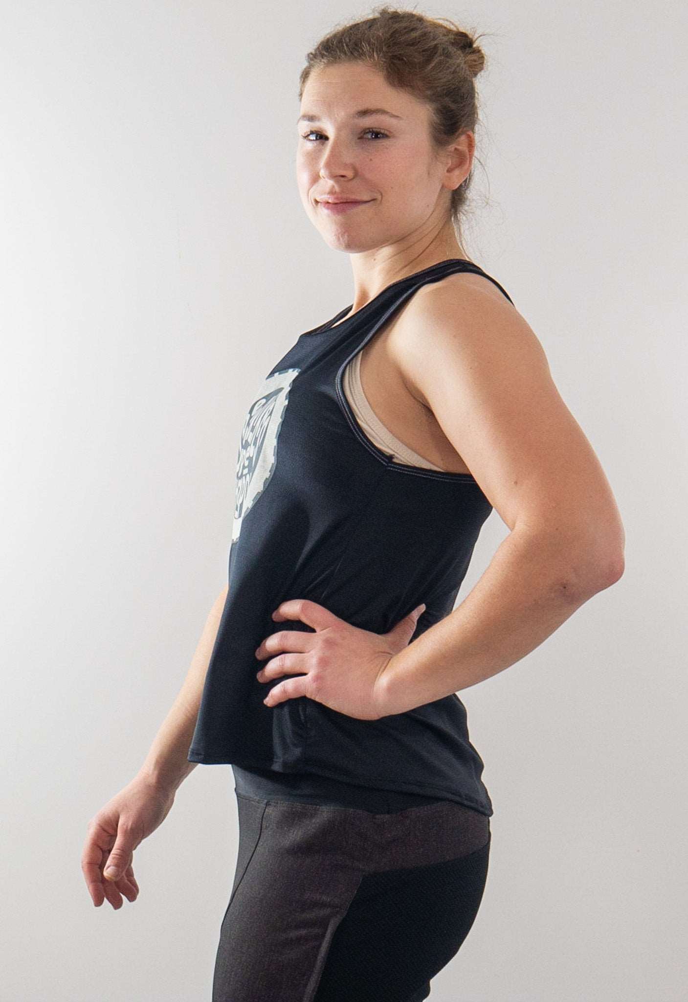 Lightweight 'Ride Bikes Be Happy' tank for mountain biking, featuring breathable mesh fabric and moisture-wicking polyester blend.