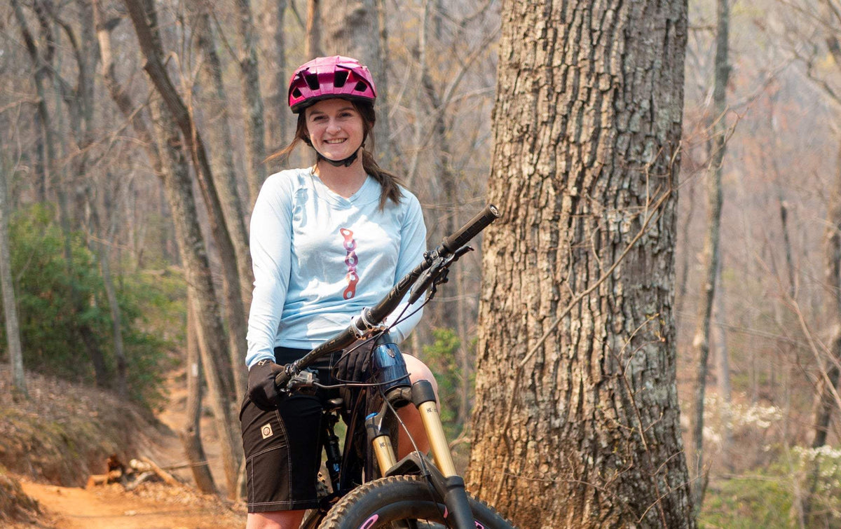 Moxie Sun Saver Hoodie with bike cog graphic, ideal for sun protection and comfort while cycling.
