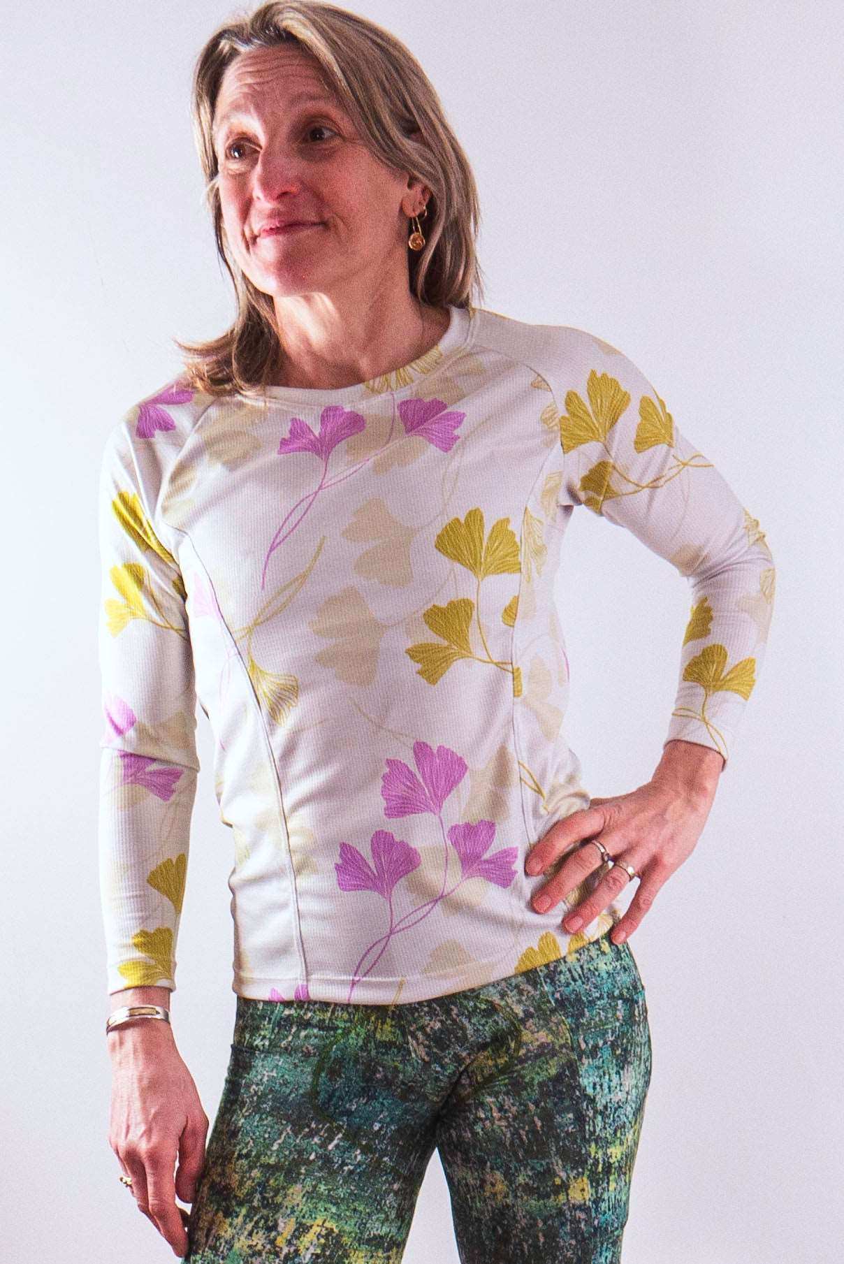 Moxie Tee jersey in moss floral design with long sleeves and moisture management fabric.