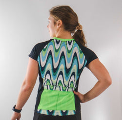 Moxie Tee Jersey Color Wave with moisture management fabric and back pockets.