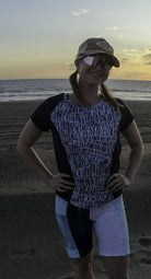Moxie Tee Jersey Blues long sleeve bike jersey with Purple Paisley design, featuring perforated mesh for moisture management and quick drying, ideal for active environments.