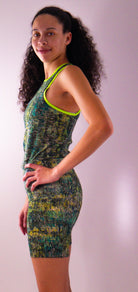 Women's sleeveless bike jersey in black and blue with breathable mesh fabric, featuring a back pocket.