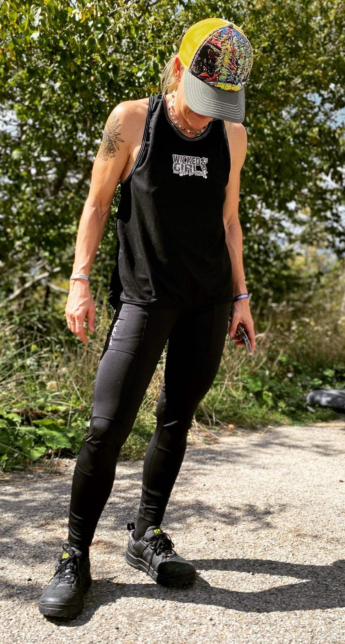 Versatile black cycling pants with large pockets, stretch fabric, and moisture-wicking technology for biking and outdoor activities.