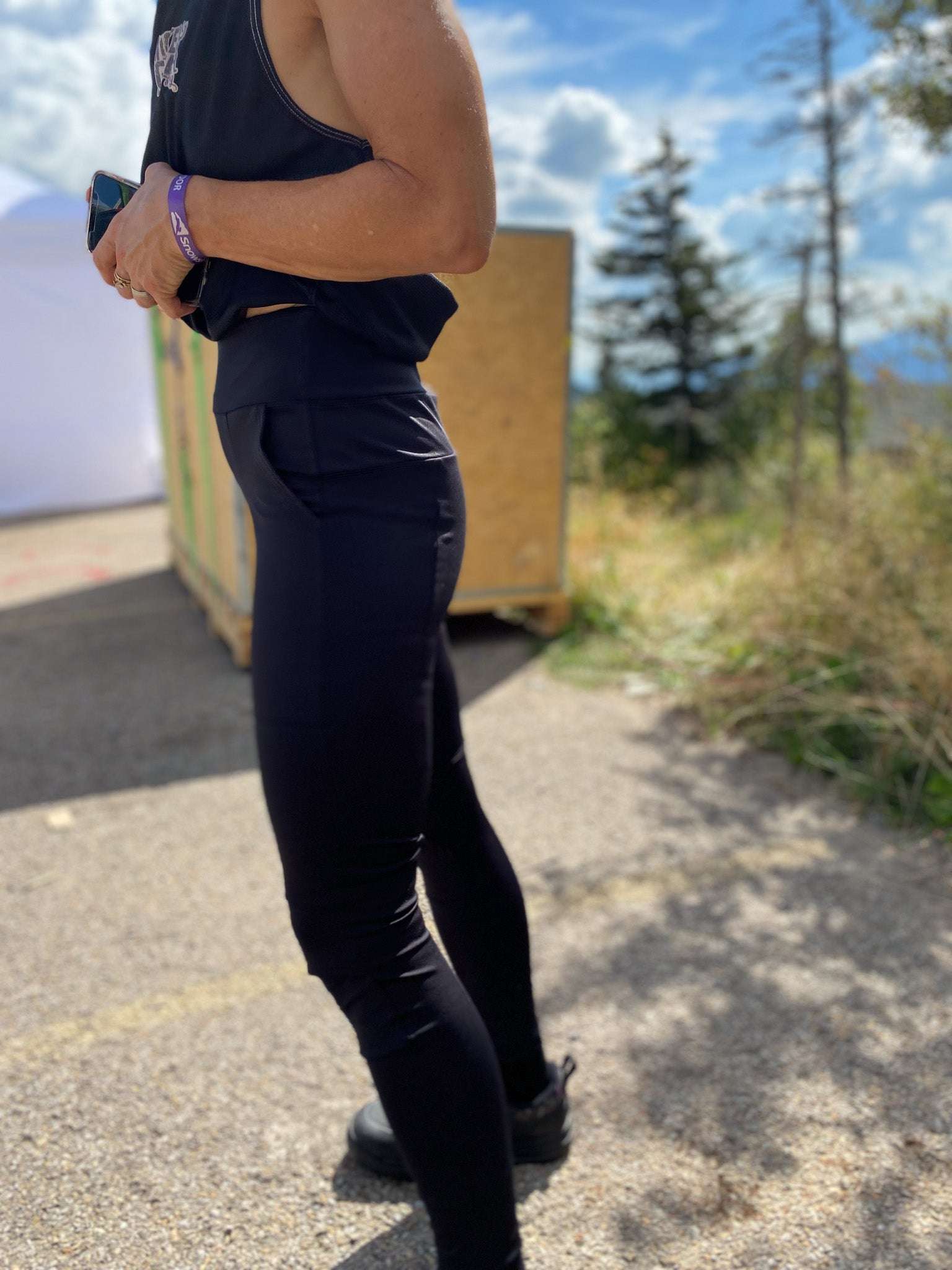 Versatile black bike cycling pants with large pockets, featuring durable stretch fabric and a comfortable yoga waistband.