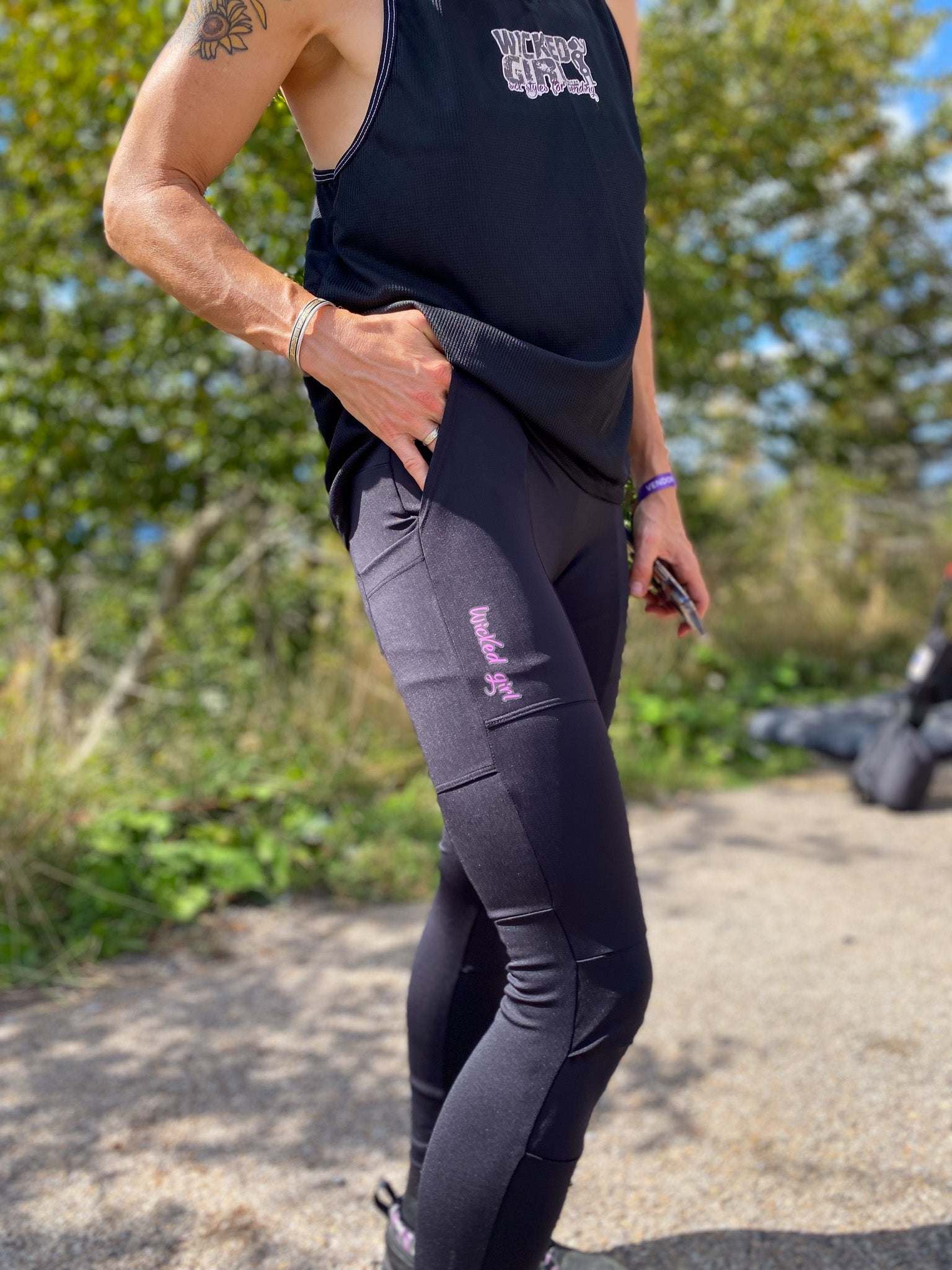 Versatile black cycling pants with large pockets and yoga waistband.
