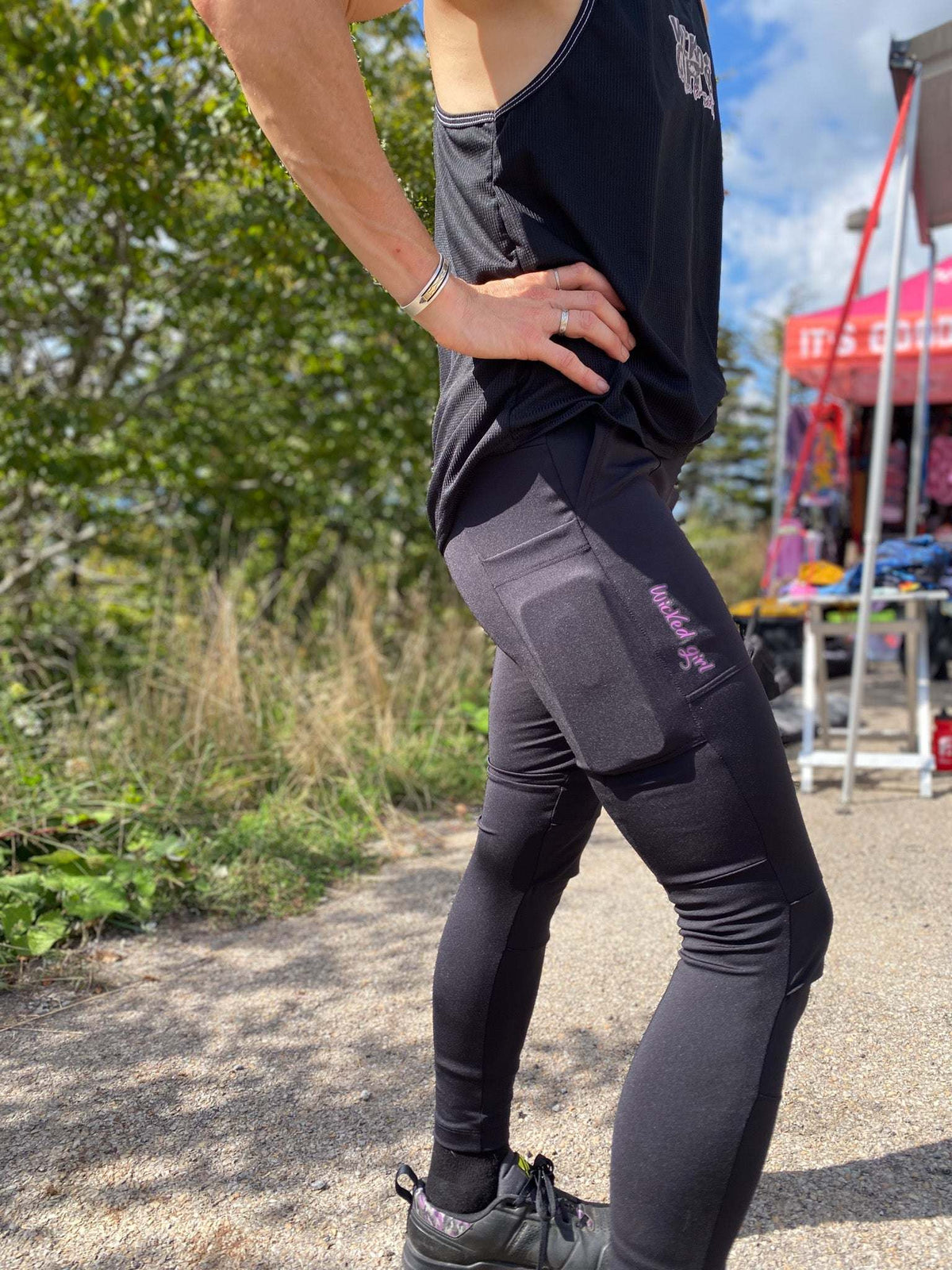 Versatile black bike cycling pants with pockets, moisture-wicking fabric, and comfortable fit.