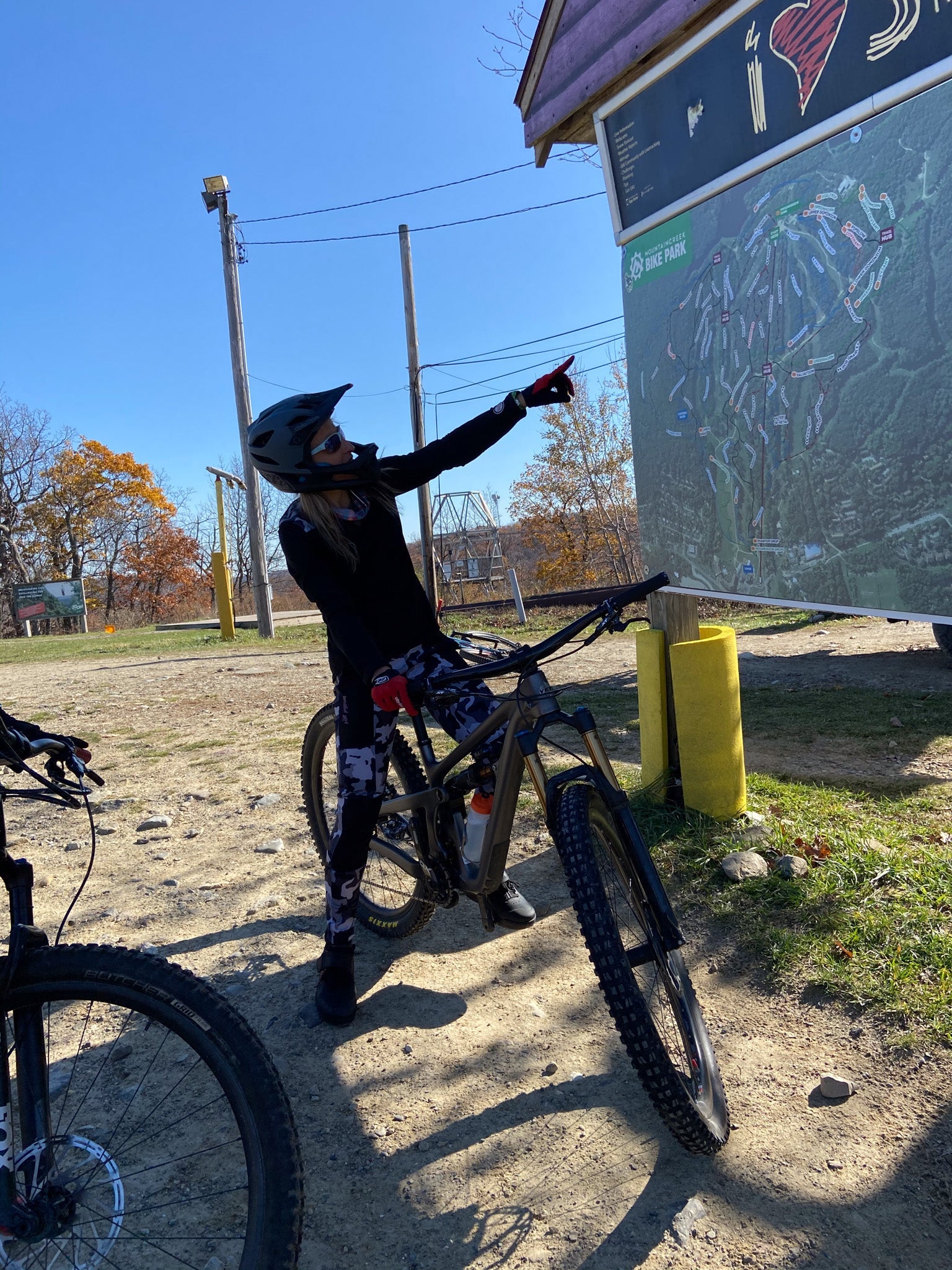 Bike cycling pants in black and white camo, featuring durable stretch fabric, large front pockets, and knee panels.