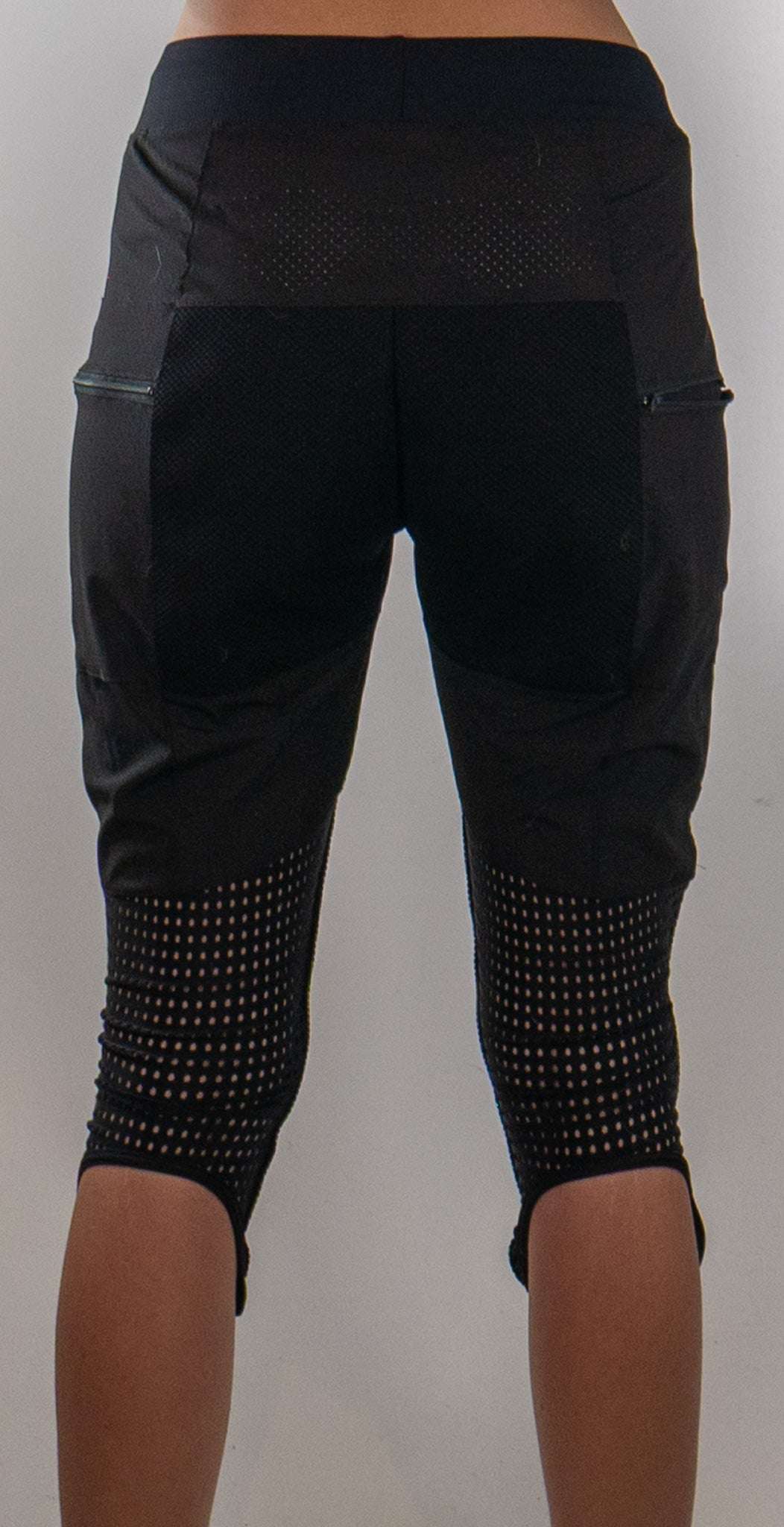 Women's mountain bike pants with removable G-Form hip and knee pads, breathable stretch fabric, and reinforced knees for durability.