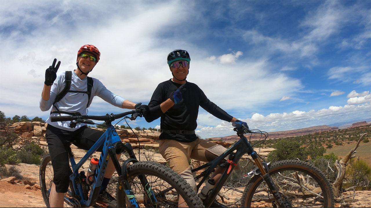 Men's G-Form Mountain Bike Jersey with removable elbow pads worn by cyclists outdoors.