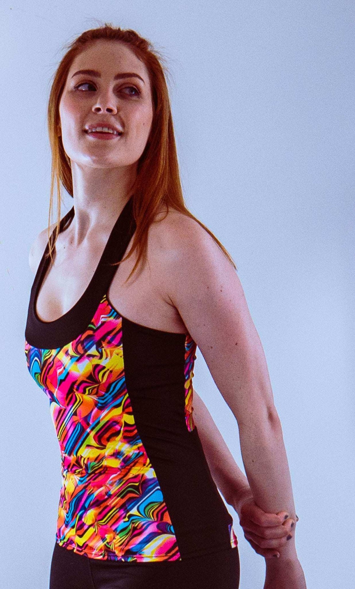 High visibility cycling top with wave design, featuring a built-in bra and moisture-wicking fabric.