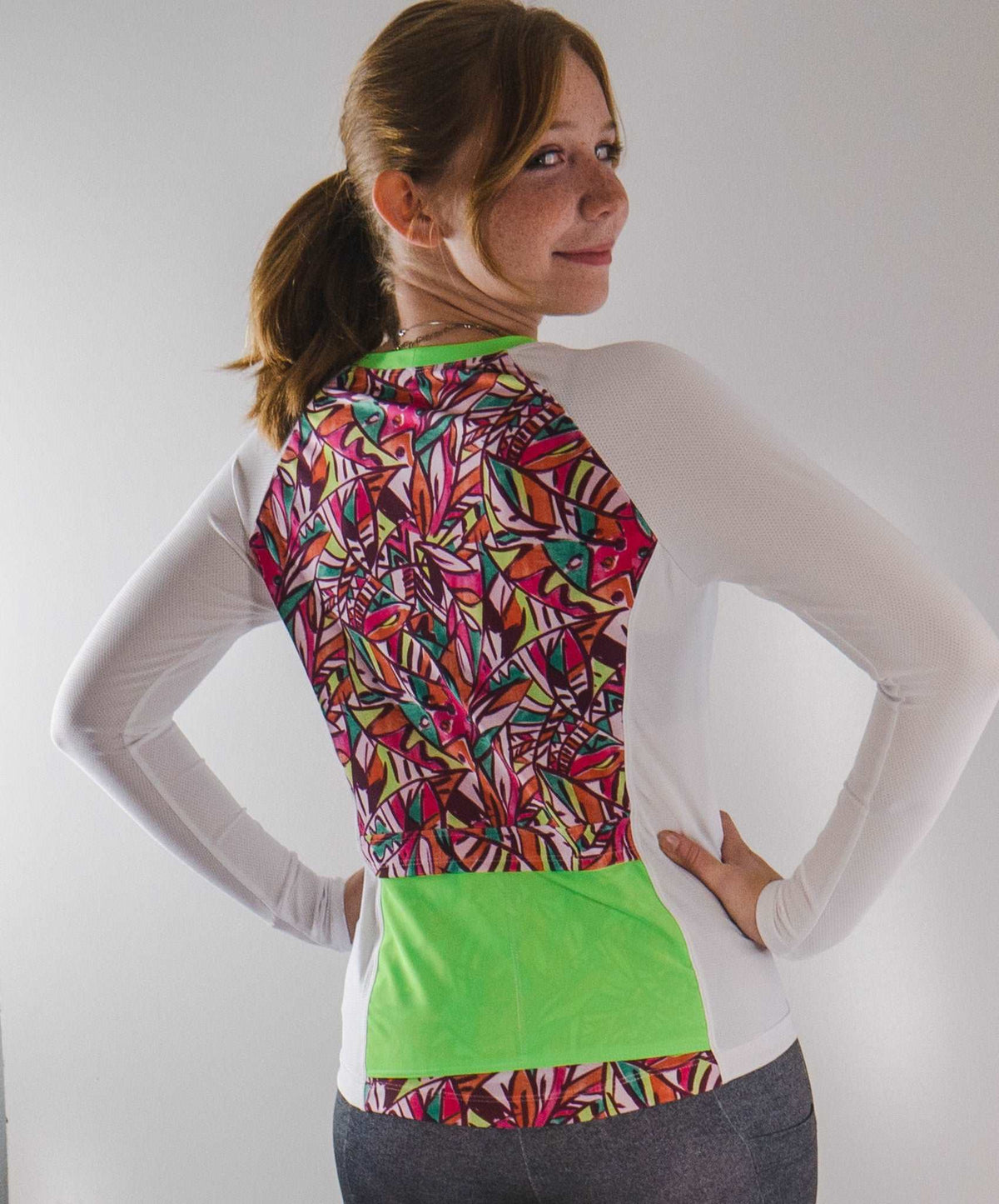 Moxie Tee Jersey High Visibility Fifi with long sleeves and colorful back design.