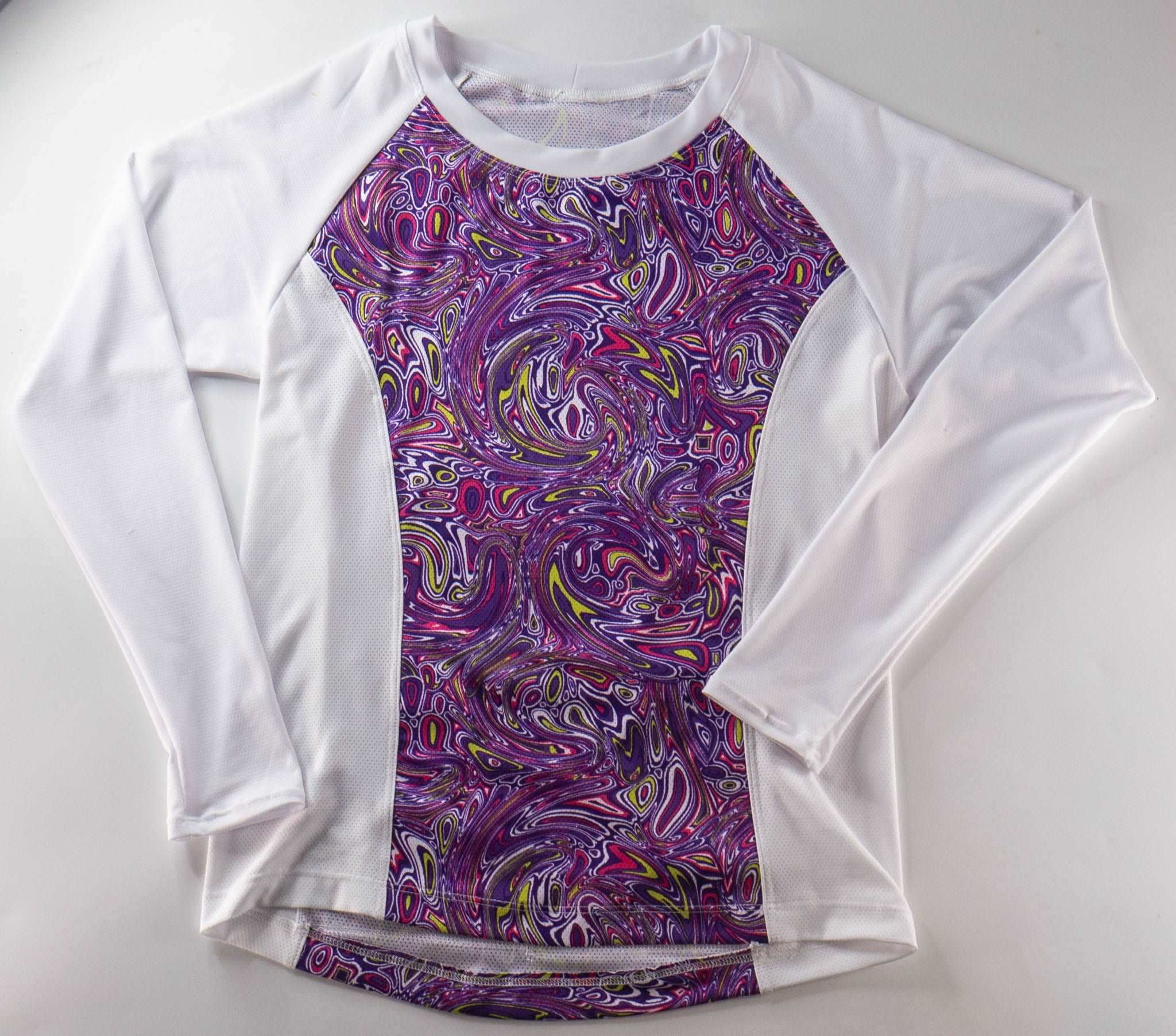 Moxie Tee Jersey Purple Paisley with long sleeves and moisture-wicking fabric.