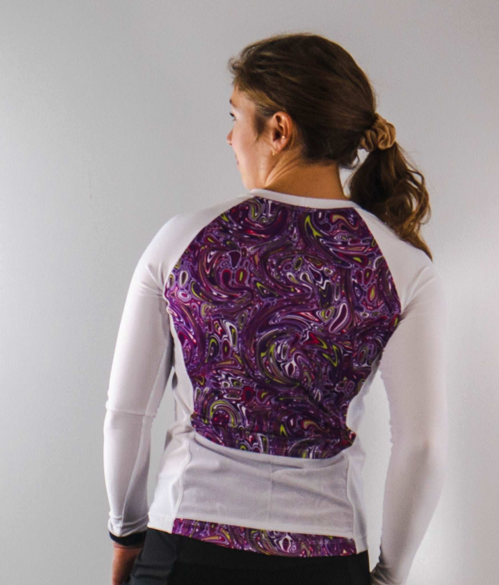 Moxie Tee Jersey Purple Paisley long sleeve bike jersey with moisture management technology.