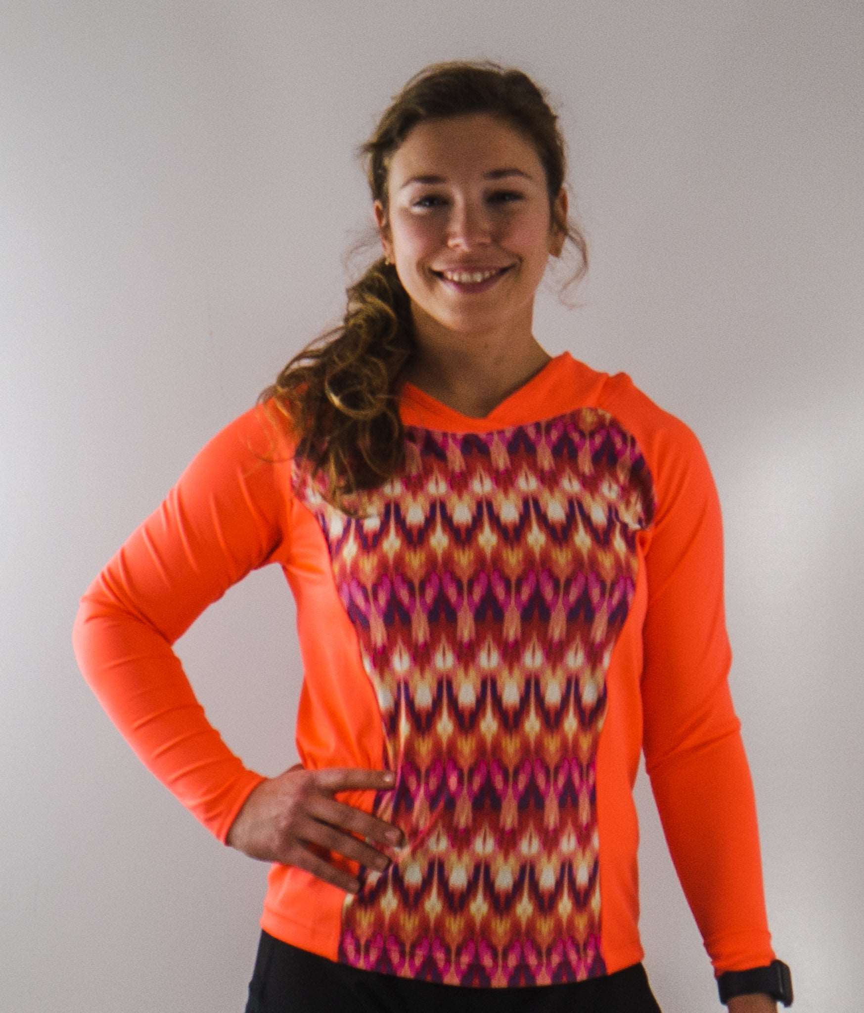 Moxie Tee Heavier Weight hoodie in vibrant design, perfect for cool day rides with moisture wicking and sun protection.