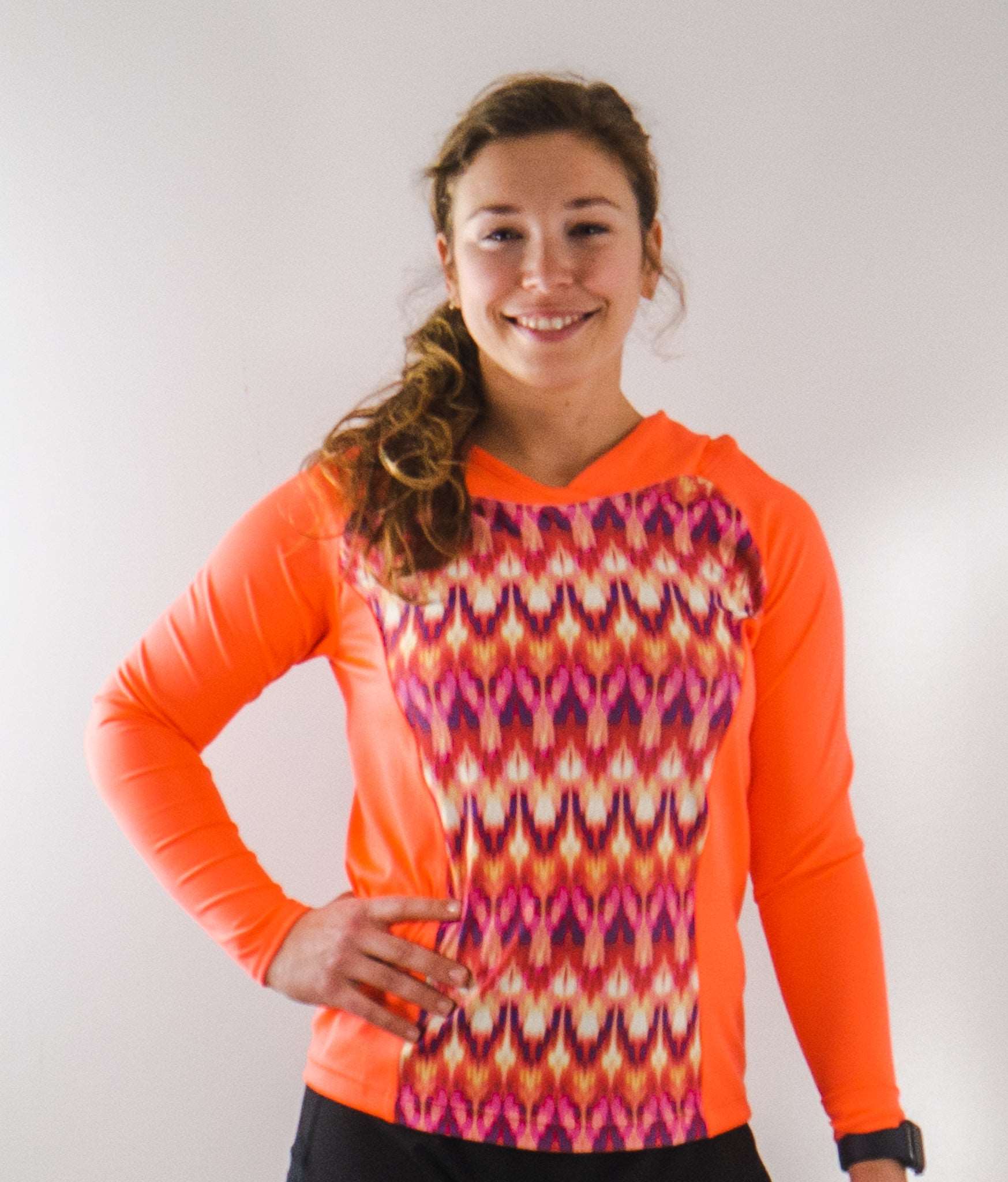 Moxie Tee Heavier Weight hoodie with vibrant design and long sleeves.