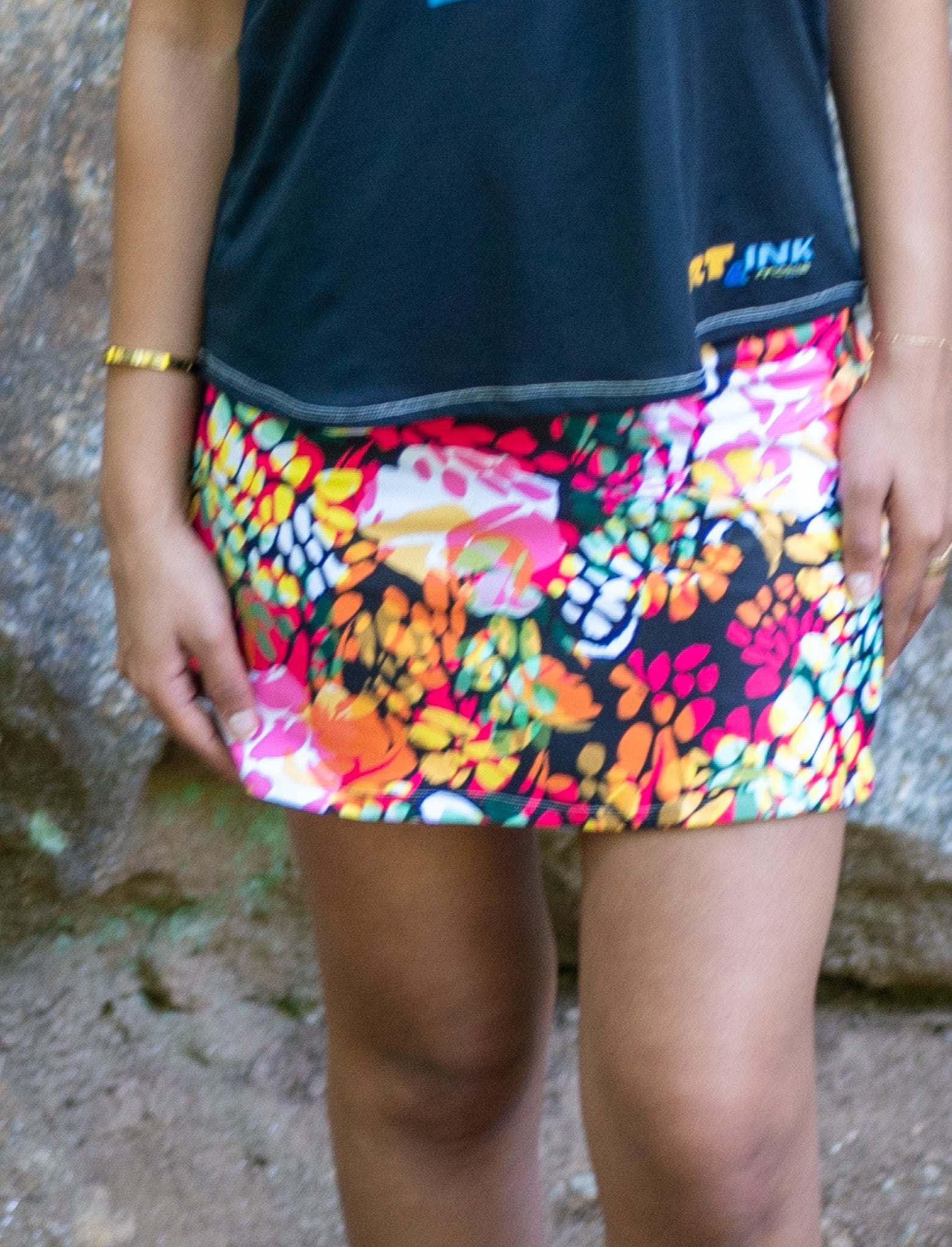 Athletic sports skirt with vibrant tropical print and breathable four-way stretch fabric
