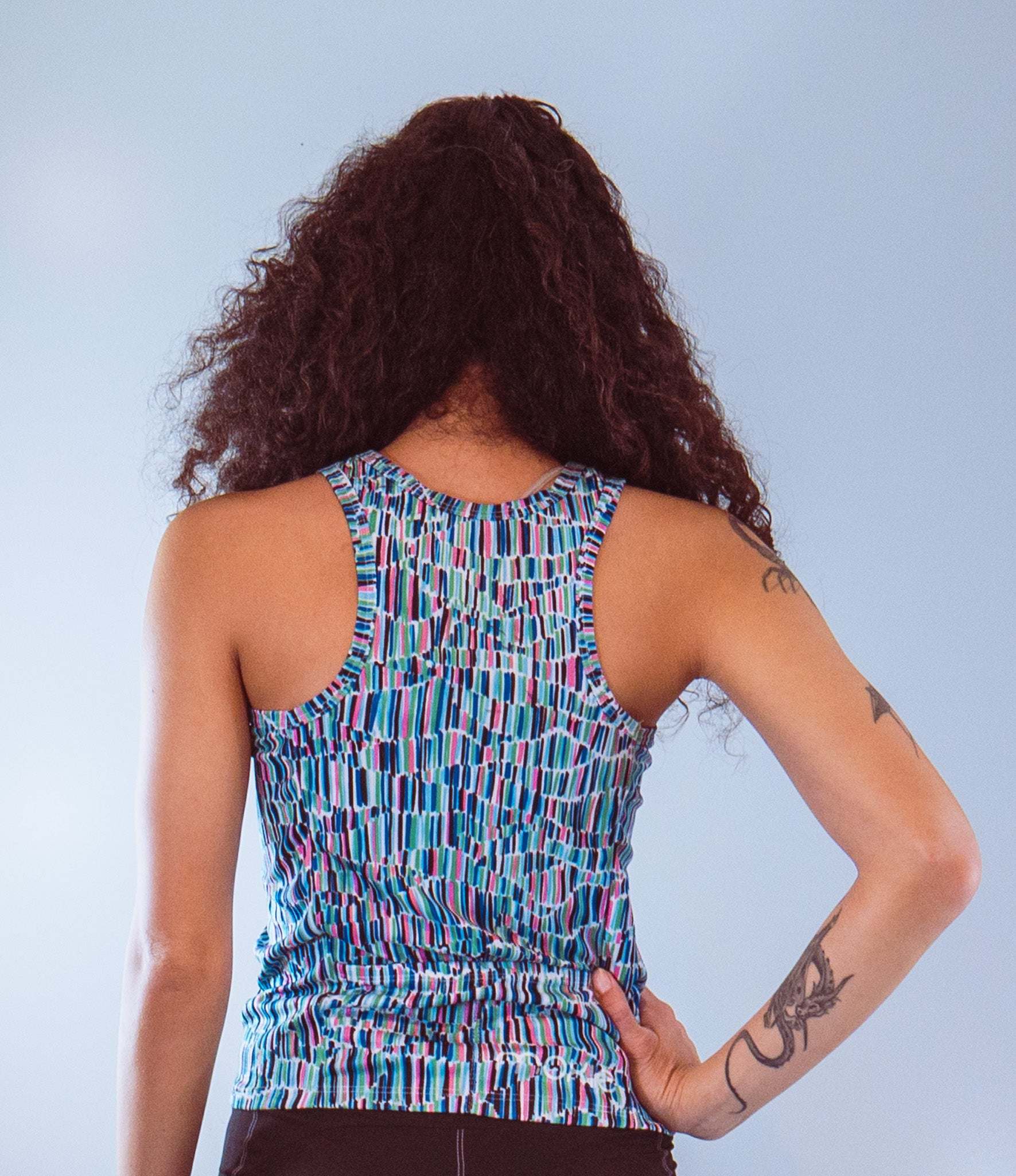 Women's sleeveless bike jersey in breathable active mesh fabric, featuring a back pocket for essentials.